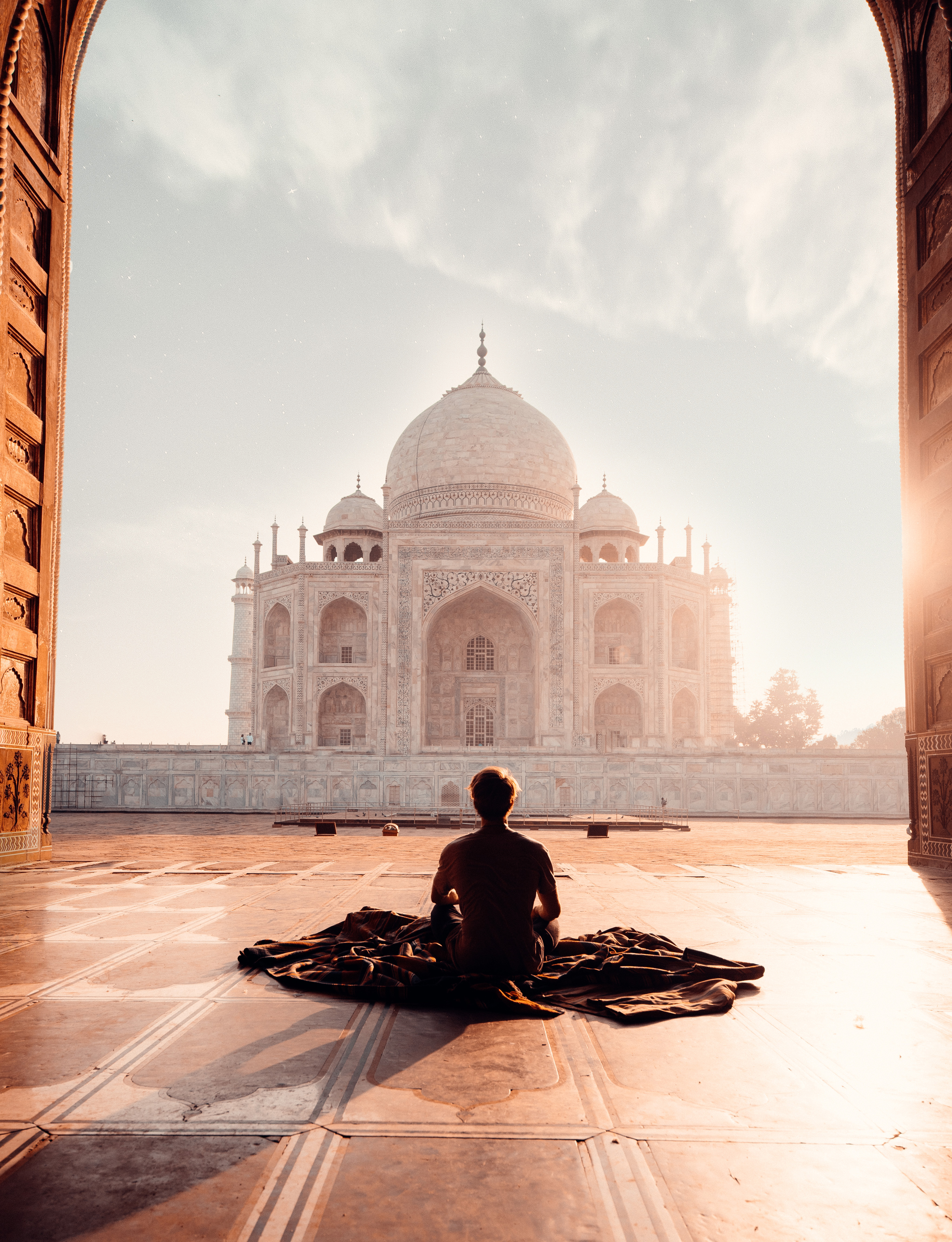 Person Sitting in Front of the Taj Mahal · Free