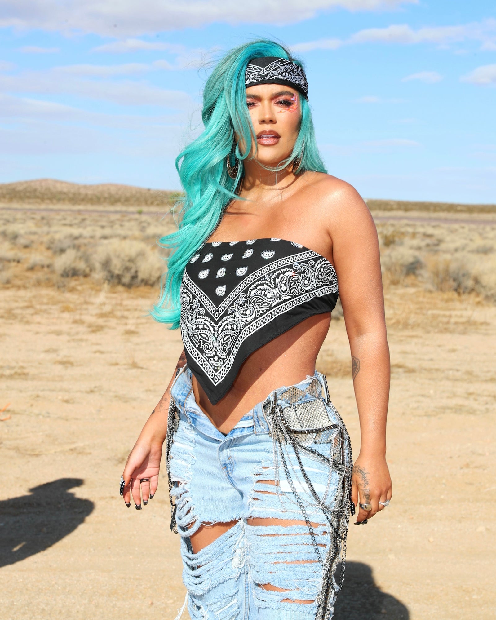Karol G Teams Up With Anuel AA & J Balvin for Twangy 'Location' Music Video