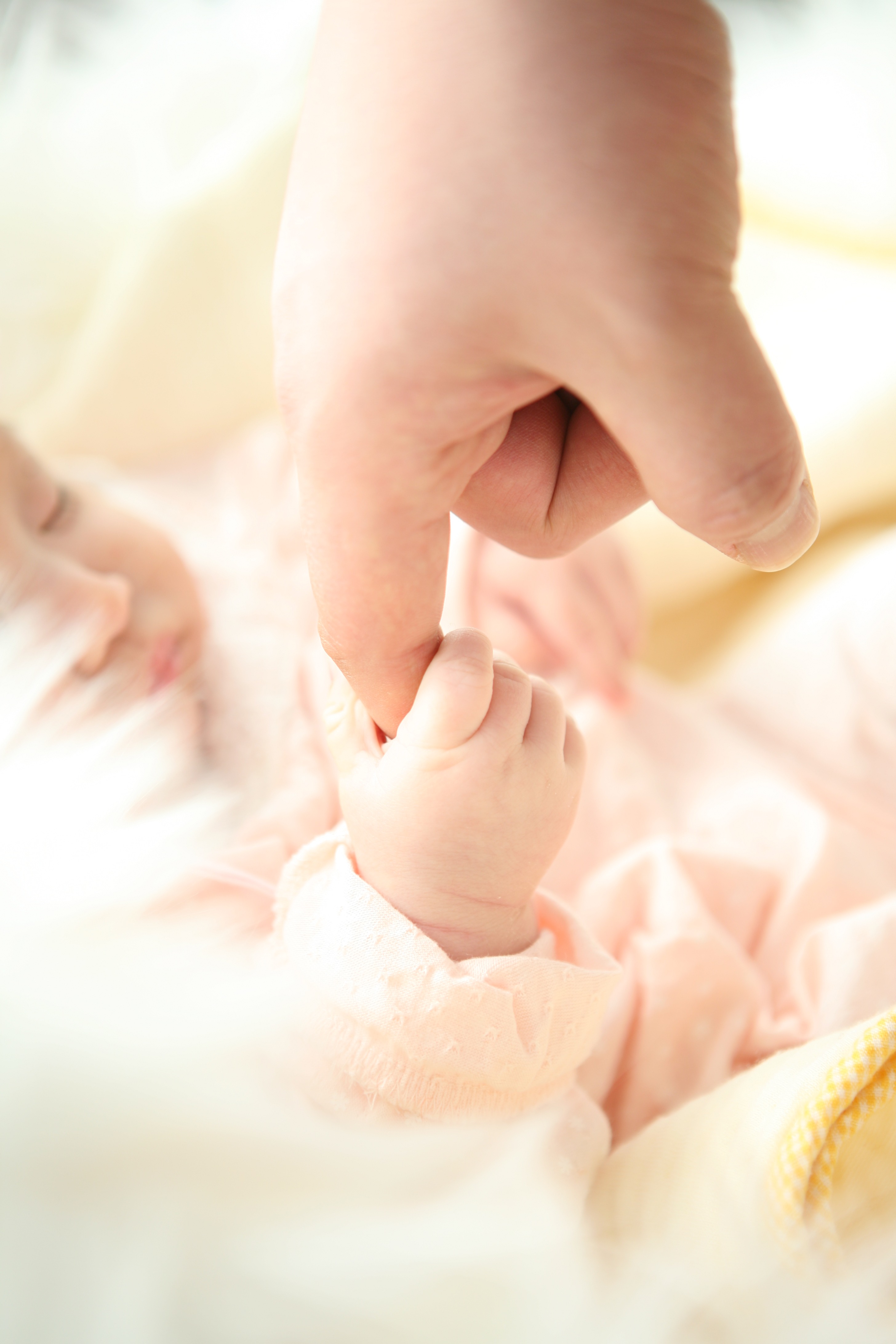 Baby Holding Person's Index Finger · Free