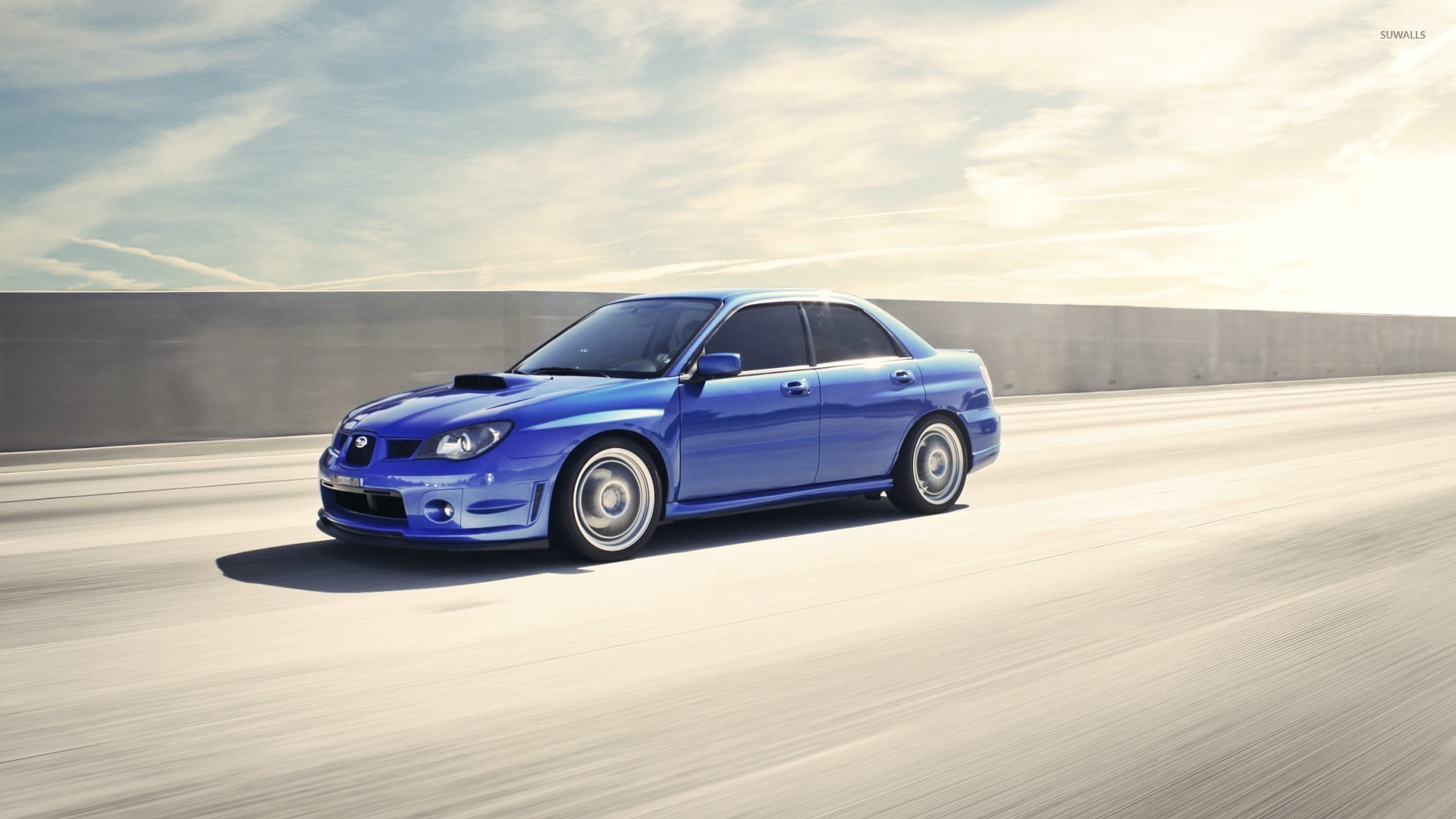 Blue Subaru Impreza WRX STI on the road wallpaper wallpaper