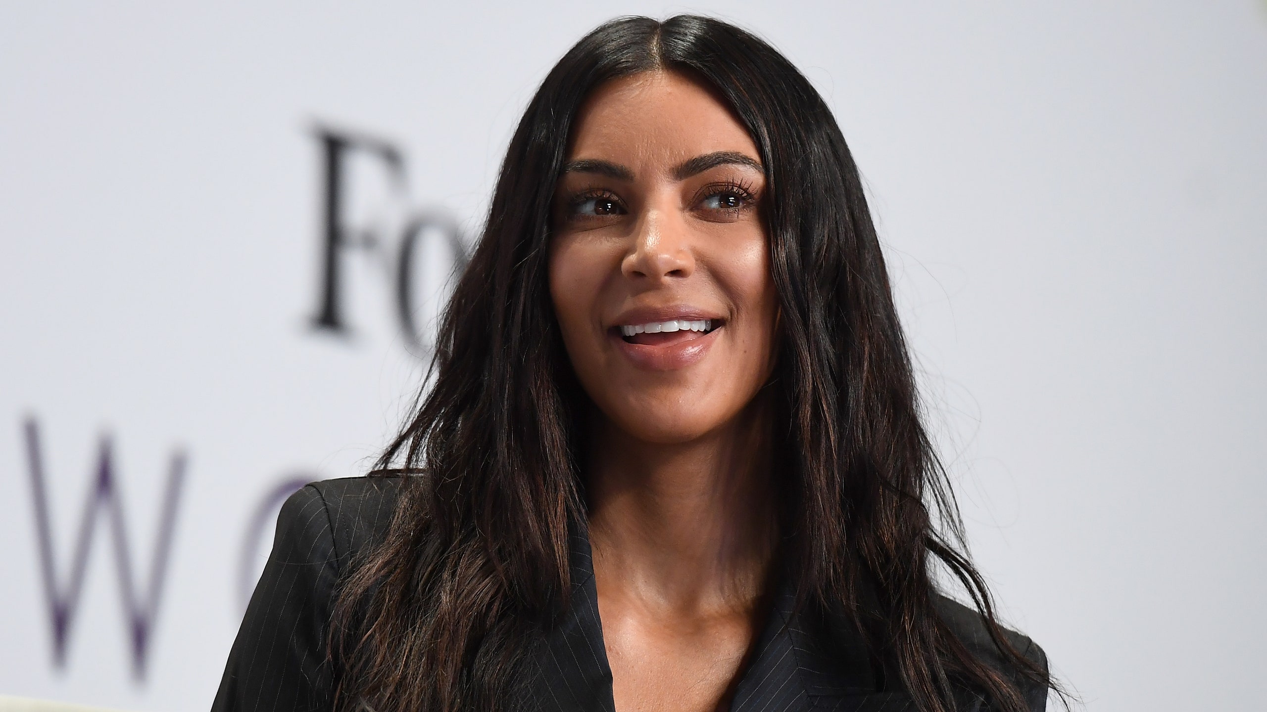 Kim Kardashian Puts the Paparazzi on Blast for Reselling Old Photo for Money