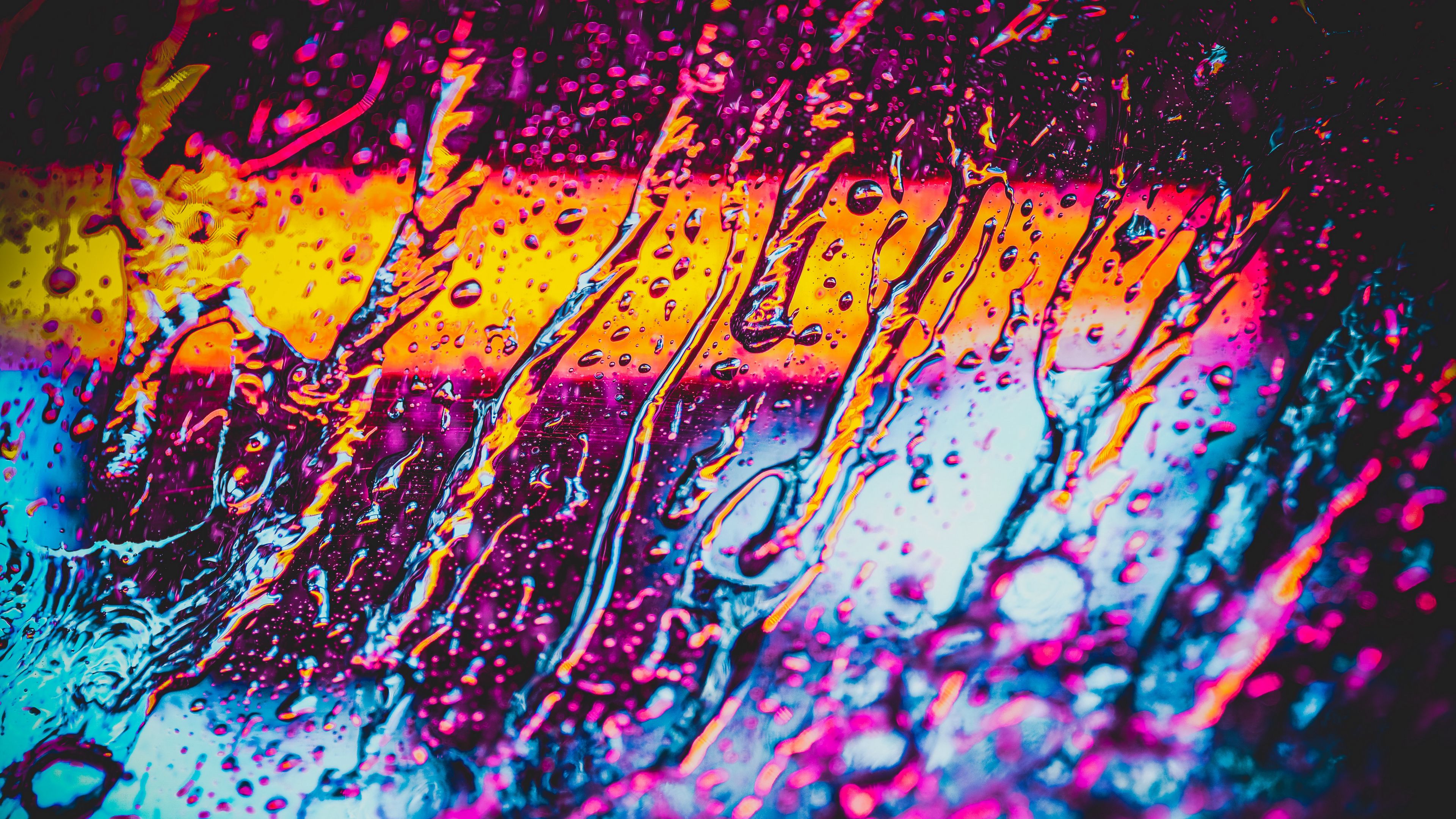 Download wallpaper 3840x2160 glass, water, neon, rain, macro 4k uhd 16:9 HD background