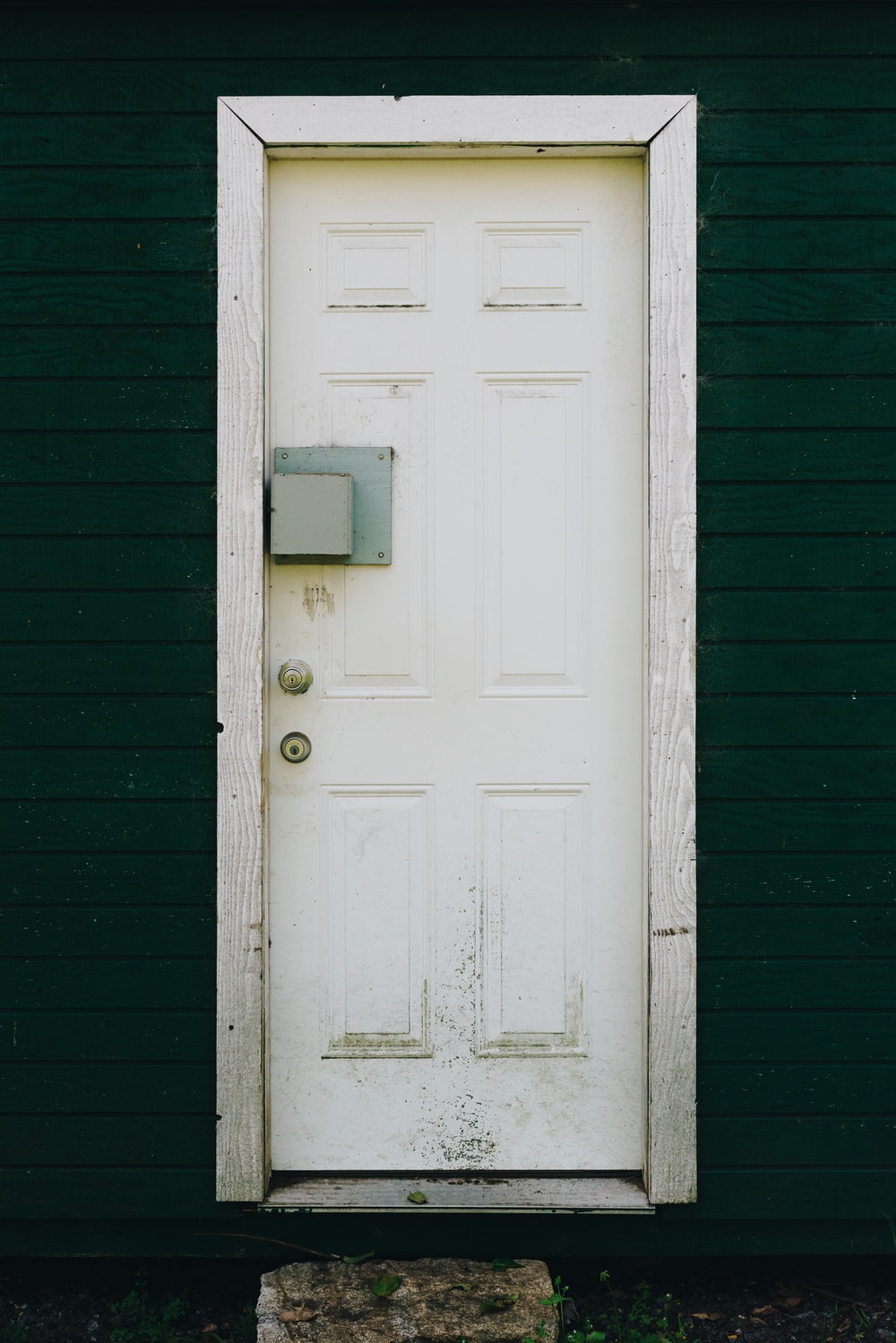 closed white wooden door photo