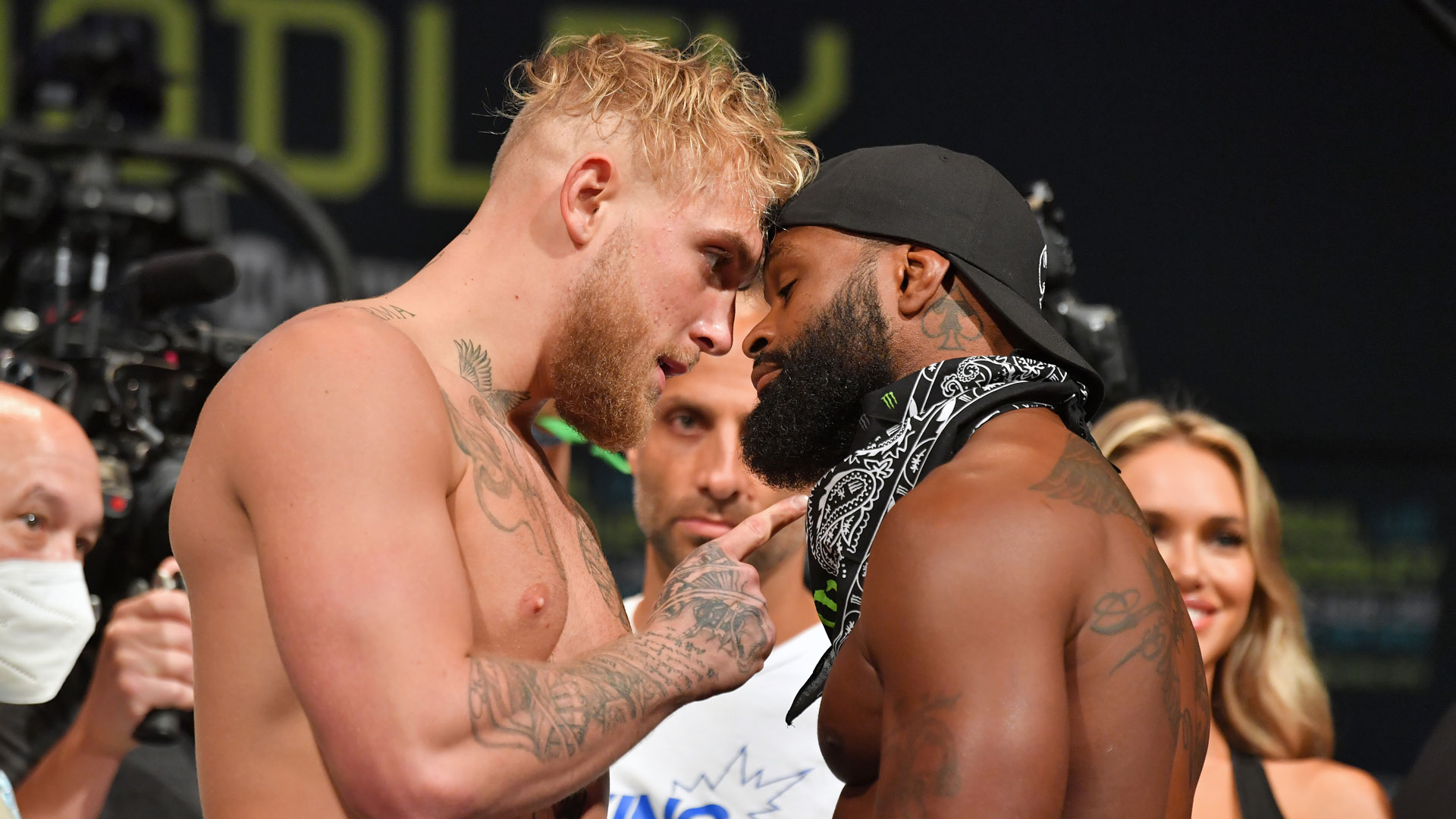 Jake Paul defeats Tyron Woodley in boxing match via split decision, hints at rematch Sports Chicago