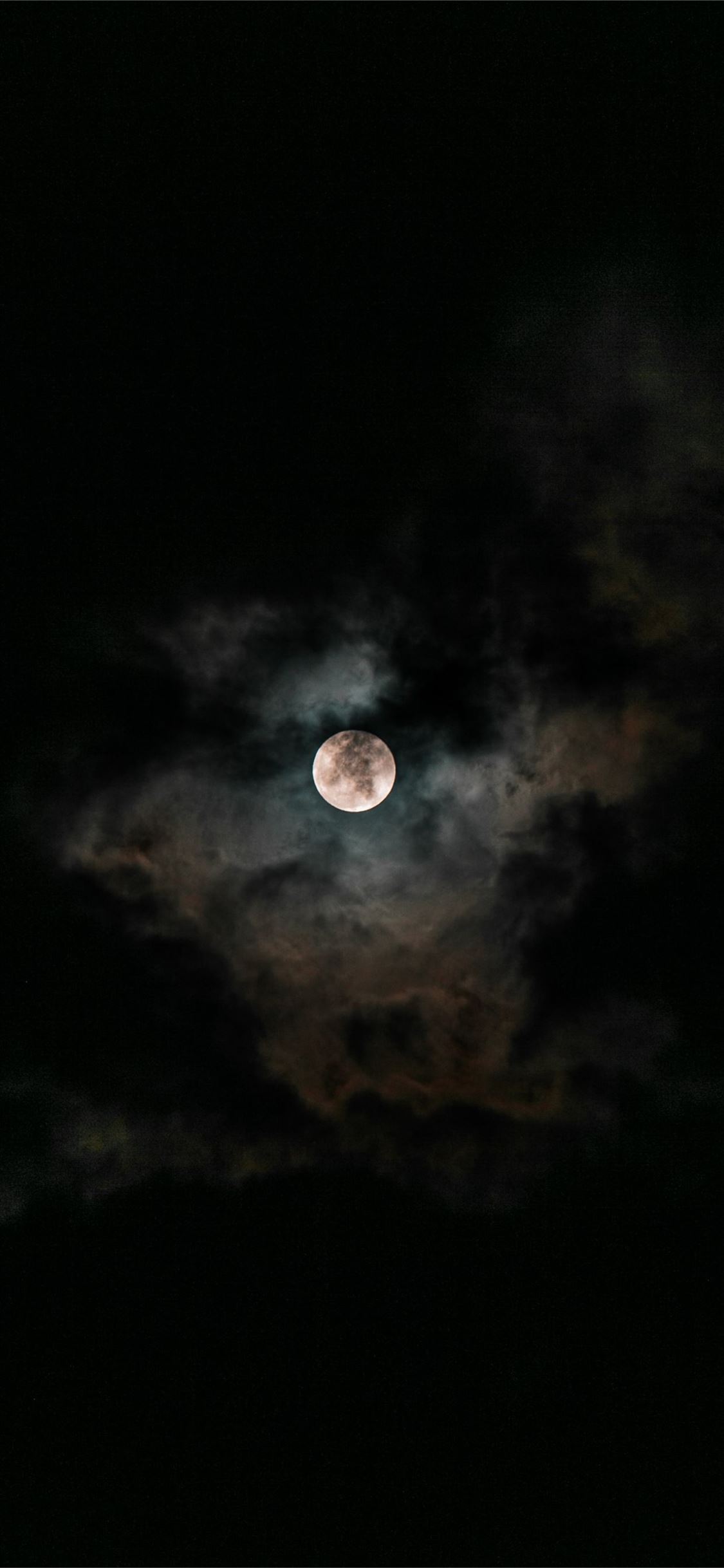 moon covered with clouds at nighttime iPhone 11 Wallpaper Free Download