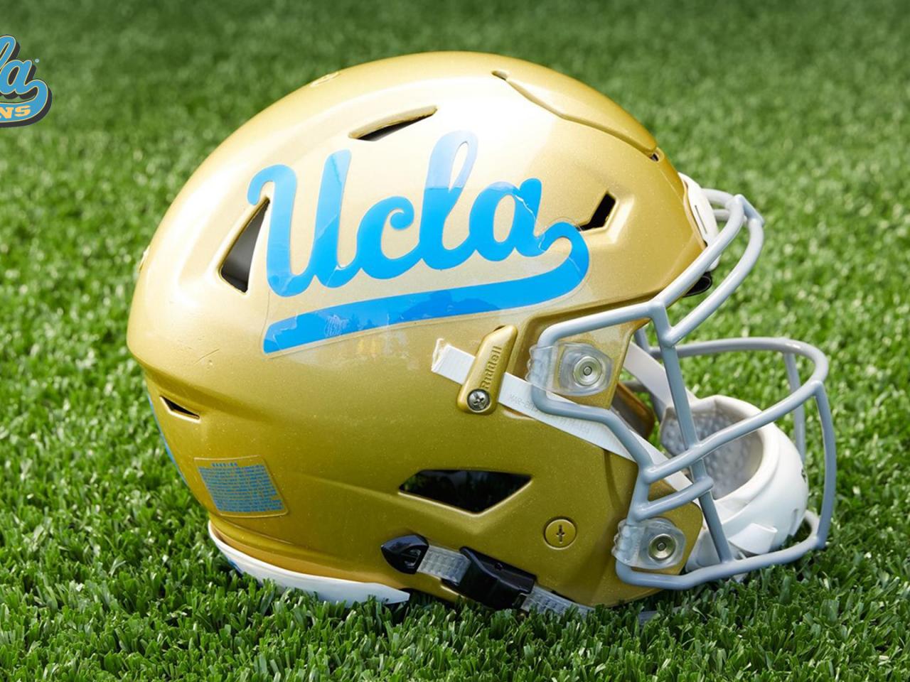 UCLA Football Wallpaper with Picture of Helmet on Grass Wallpaper. Wallpaper Download. High Resolution Wallpaper