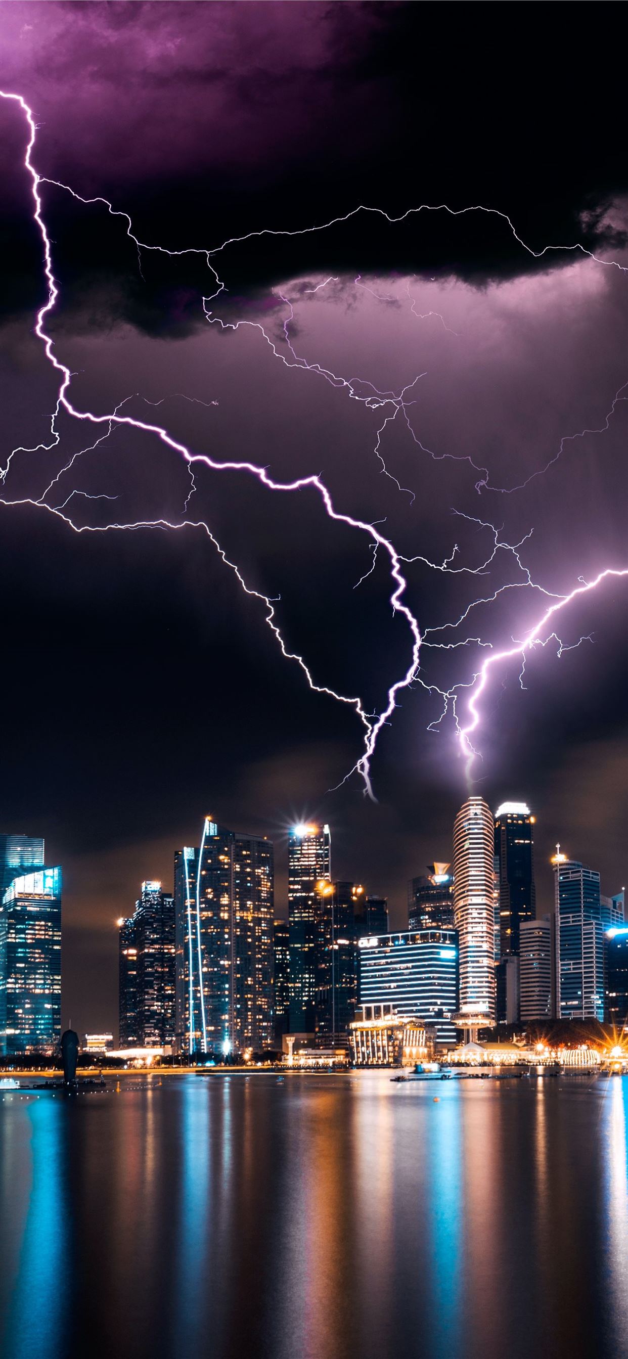 lightning storm over skyscrapers iPhone X Wallpaper Free Download