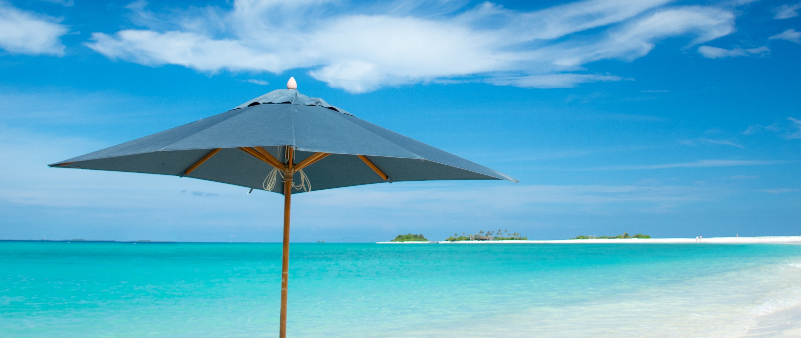 Download umbrella, beach, tropical island, summer 2560x1080 wallpaper, dual wide 2560x1080 HD image, background, 17657