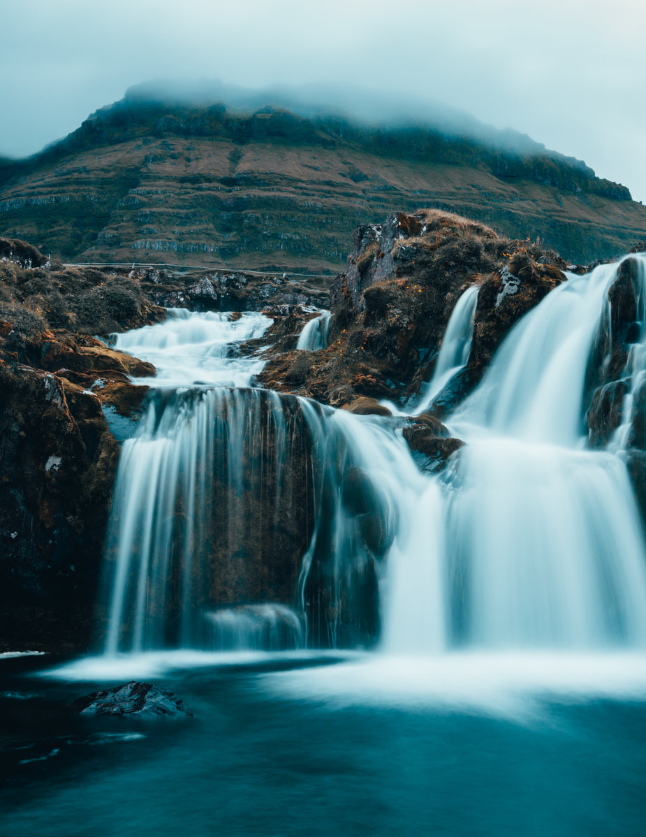 Browse Free HD Image of Cloudy Waterfall At The Base Of A Mountain
