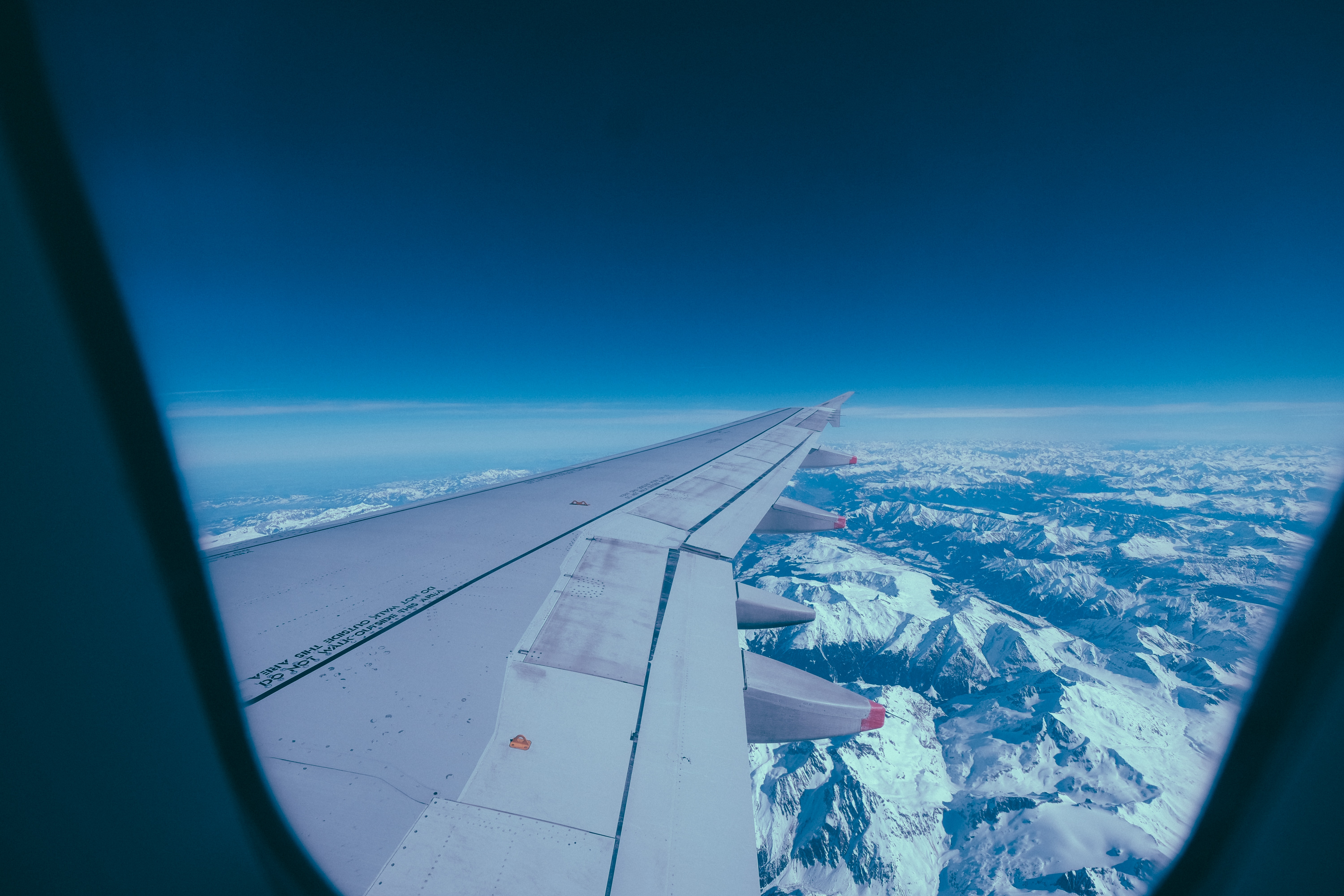 airplane window view of mountains during daytime High resolution and Full HD Wallpaper Free Download