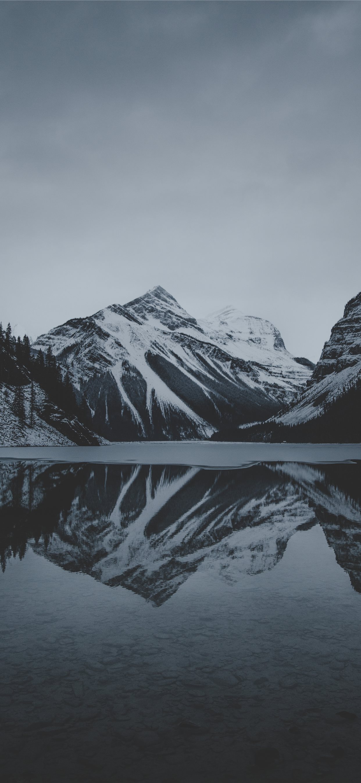 snow mountains and lake undr gray sky iPhone 11 Wallpaper Free Download
