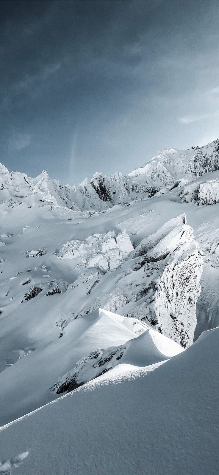 snow covered mountain under blue sky during daytim. #mountain #nature #snow #grey #mountain. Landscape wallpaper, Winter landscape, Winter landscape photography