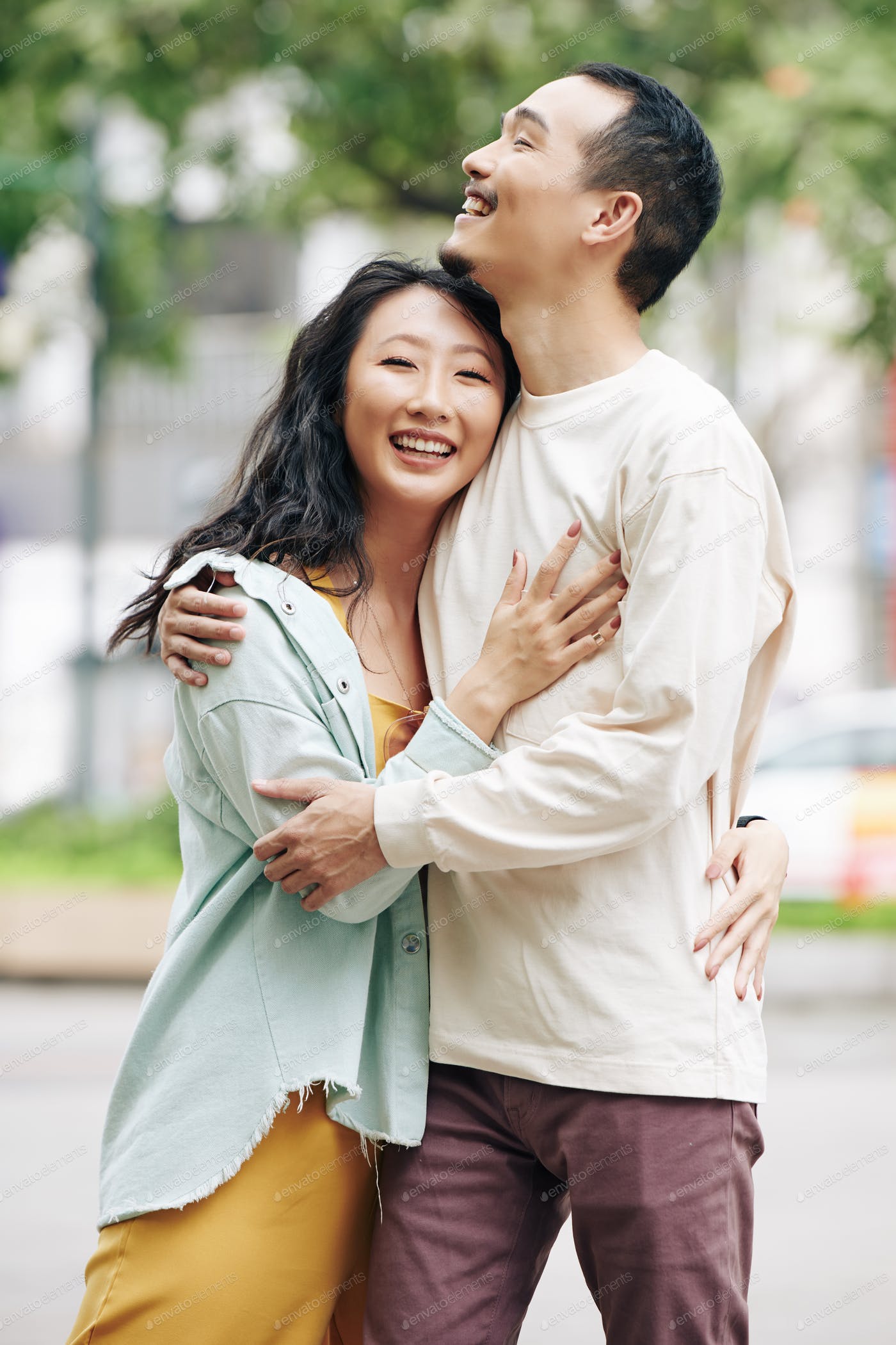 Happy Chinese couple in love photo by Dragonimage on Envato Elements