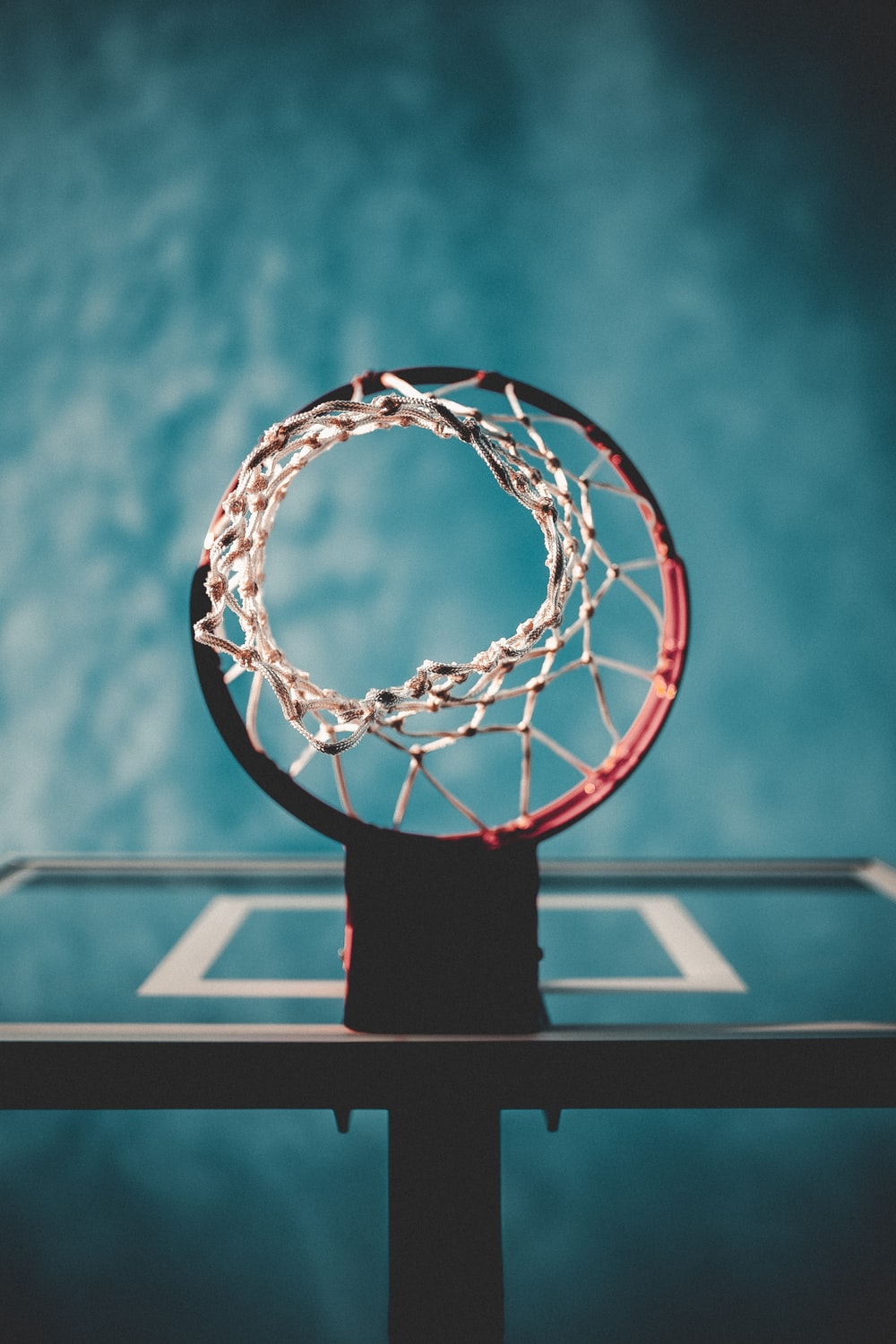 low angle photography of basketball hoop photo