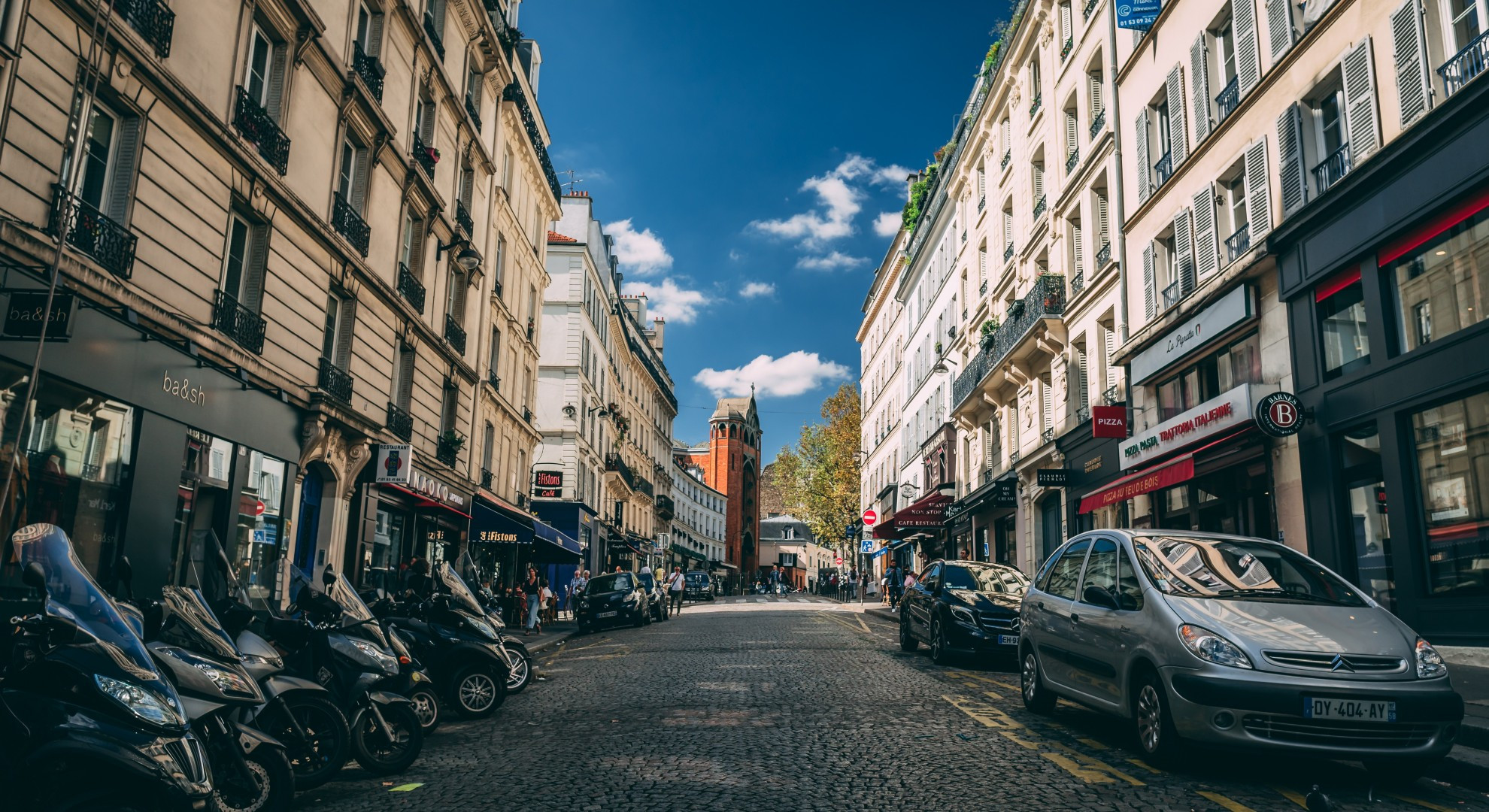 Download 1980x1080 Urban, Street, Cars, Buildings, Sky, Shopping, Restaurants Wallpaper