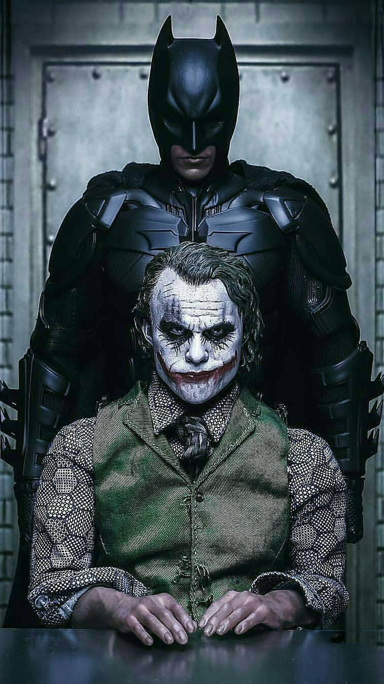 Joker vs Batman iPhone 13 Wallpaper