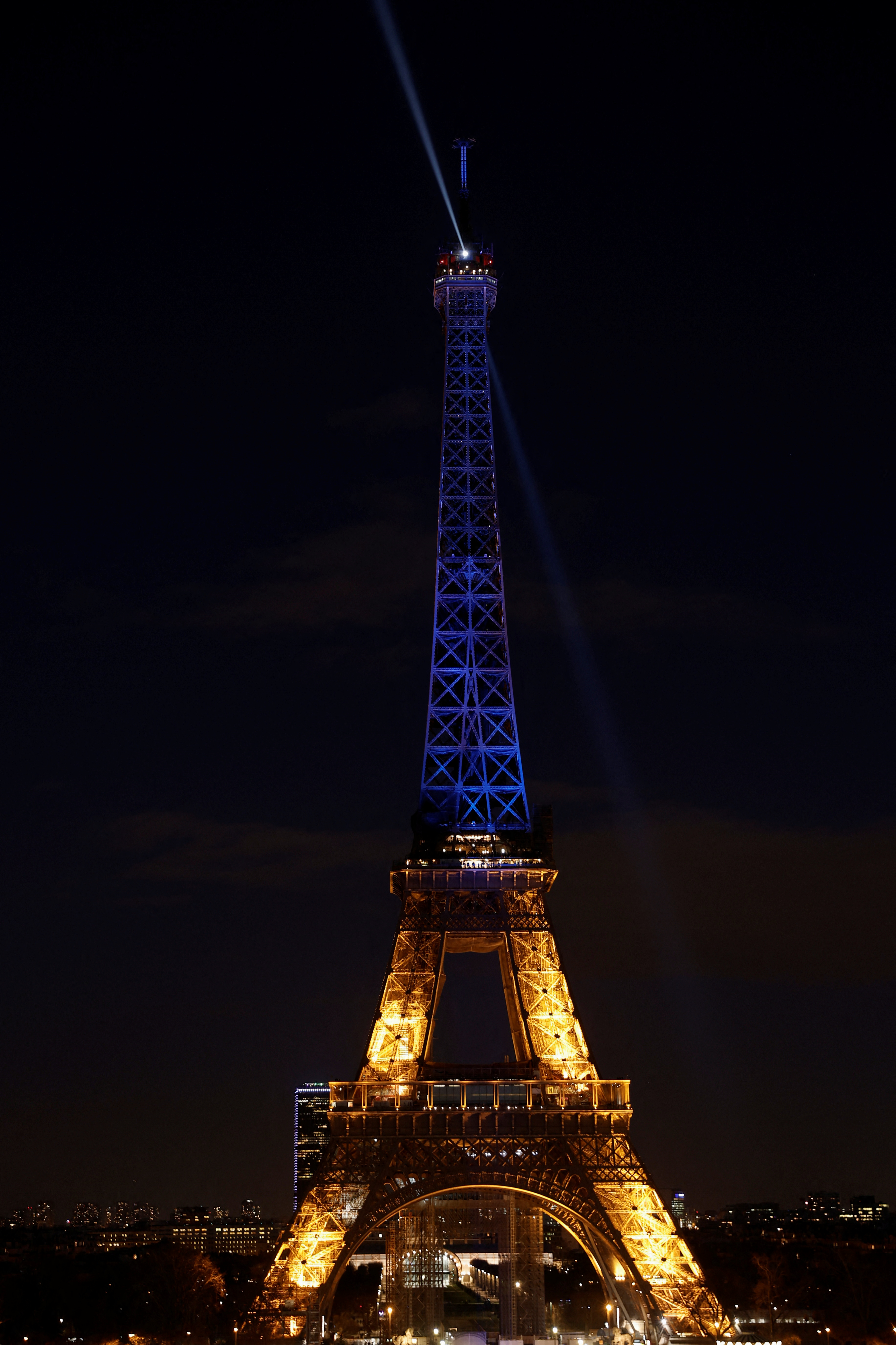 Paris' Eiffel Tower lights up in national colours of Ukraine