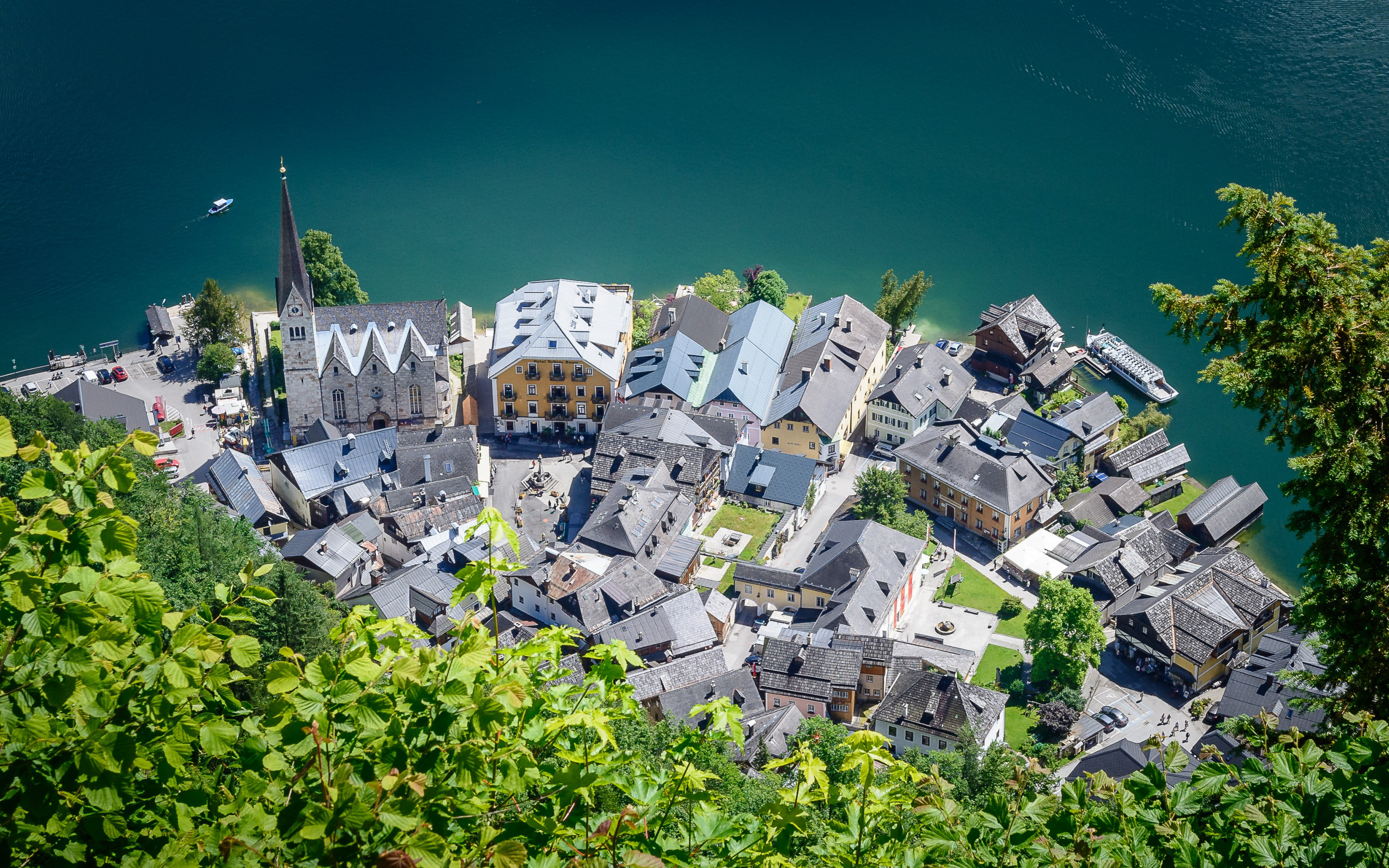 Download wallpaper Hallstatt, view from above, aerial view, summer, cityscape, chapel, mountain lake, Salzkammergut, Austria for desktop with resolution 2880x1800. High Quality HD picture wallpaper