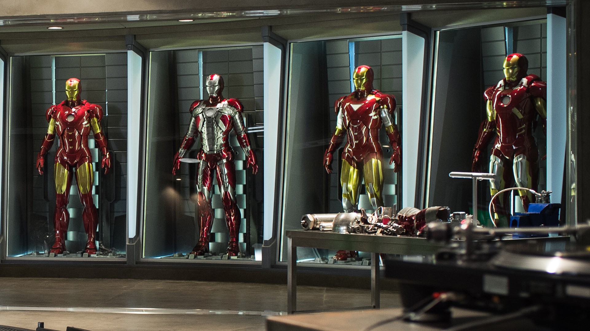 Iron Man suits on Tony Stark's lab