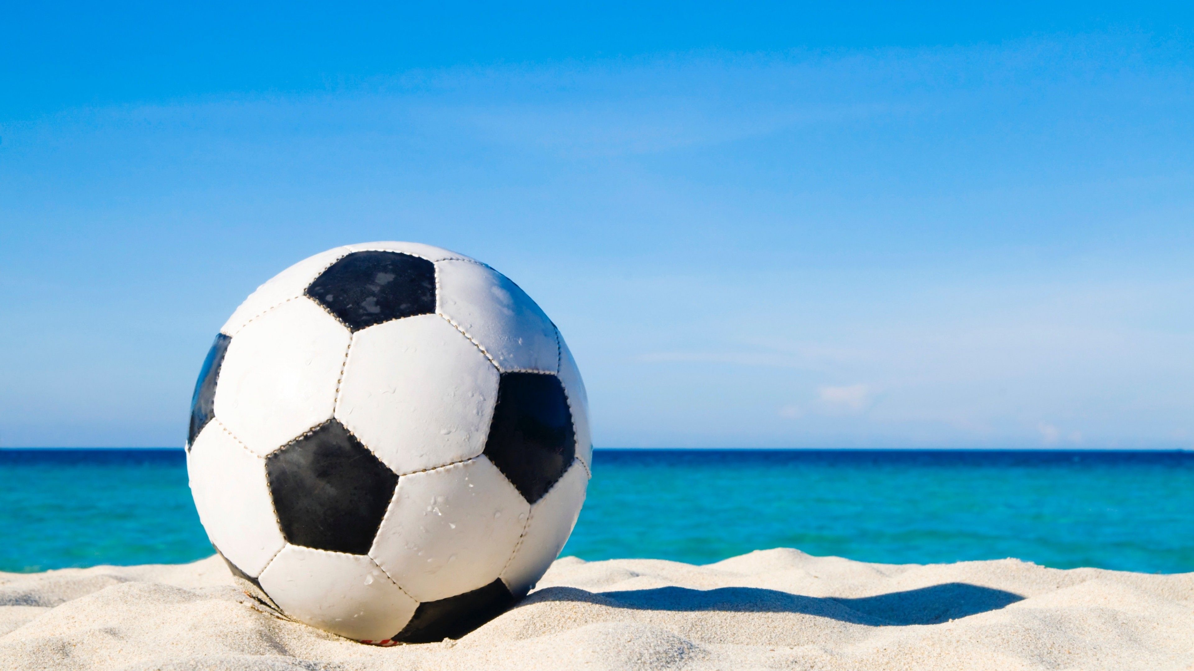 Beach at a Soccer Ball Wallpaper