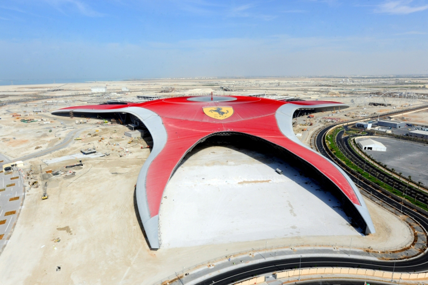 Incredible picture of Ferrari World Abu Dhabi then and now. Time Out Abu Dhabi