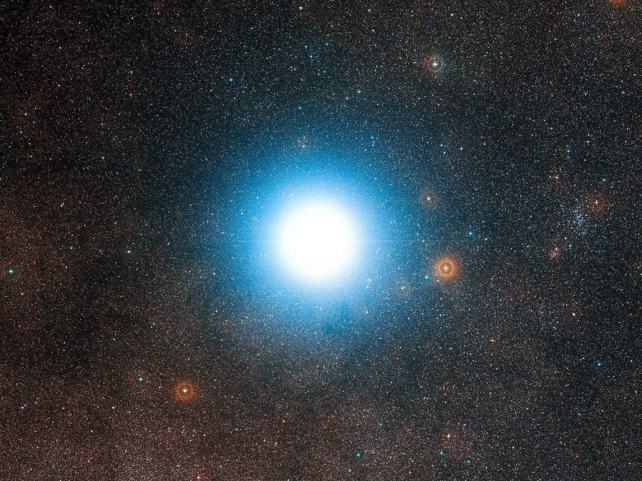 The bright star Alpha Centauri and its surroundings