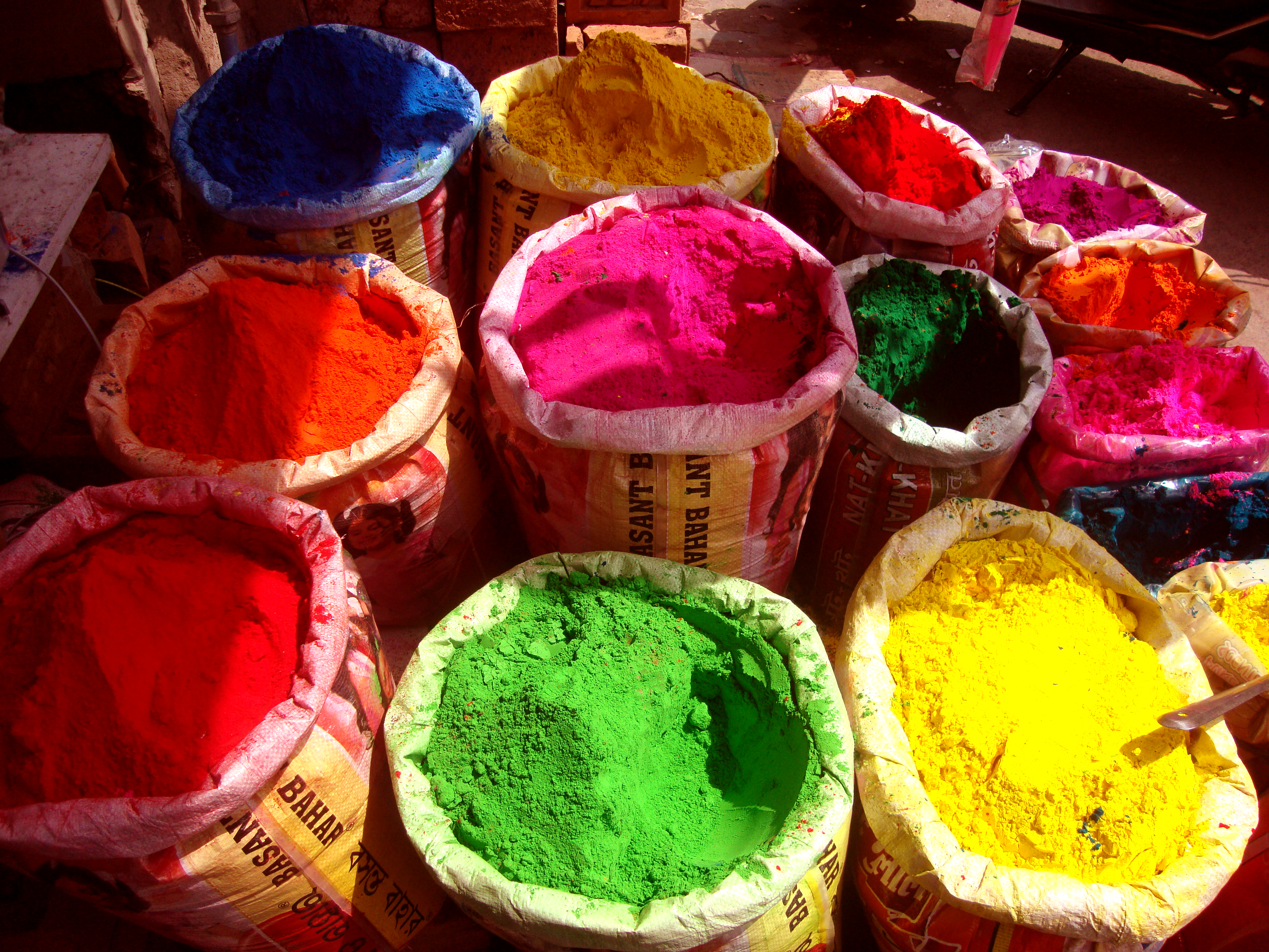 Holi festival greeting background with pots and gulal (paint). • wall  stickers vibrant, wallpaper, traditional | myloview.com