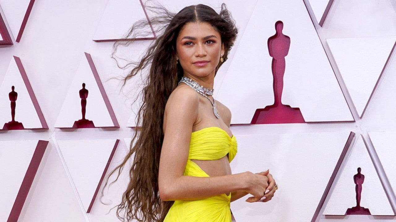 Zendaya Stuns In Yellow Cut Out Dress That Glows In The Dark At 2021 Oscars