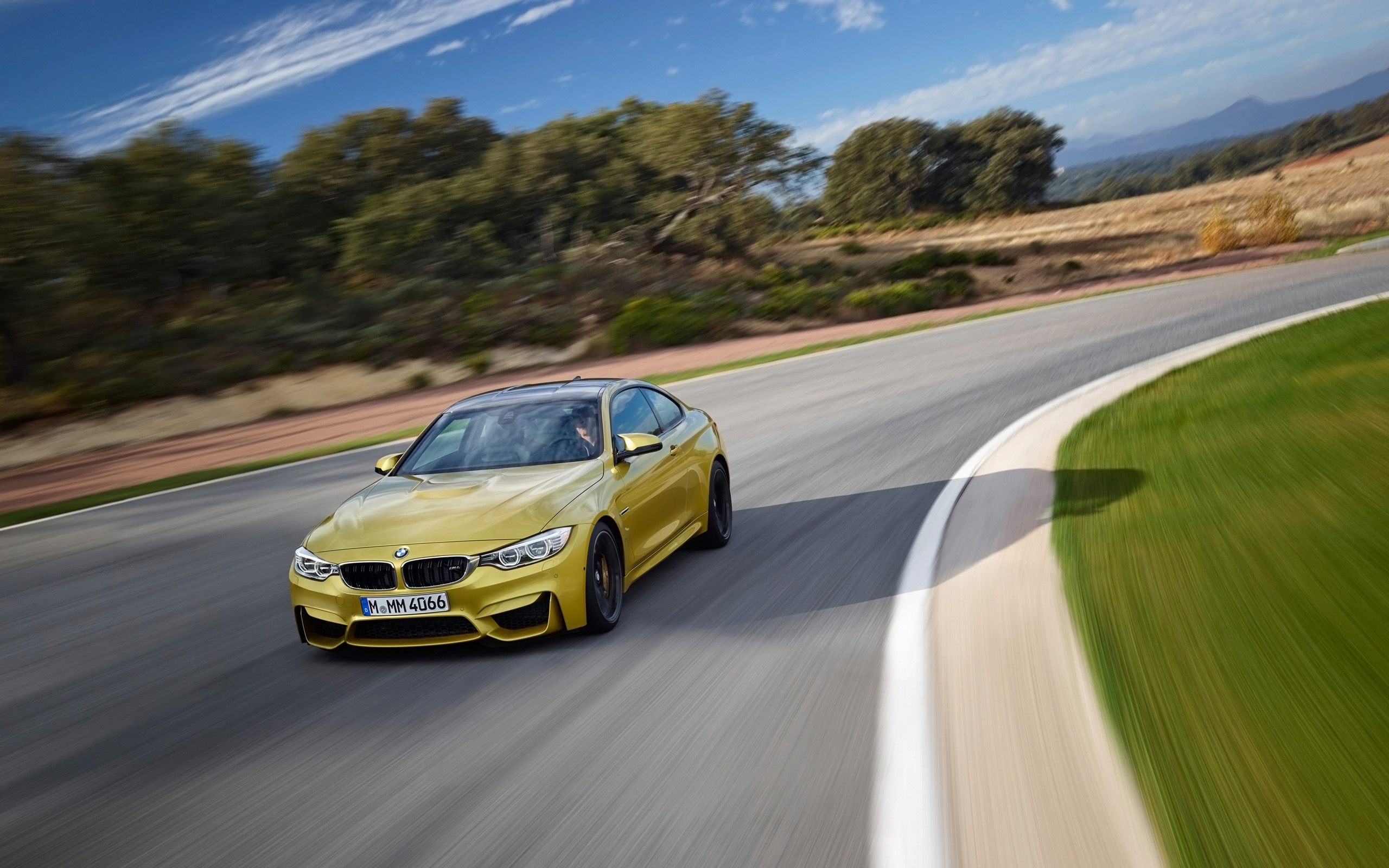 BMW M4 Coupe Motion Front Angle wallpaper BMW M4 Coupe Motion Front Angle