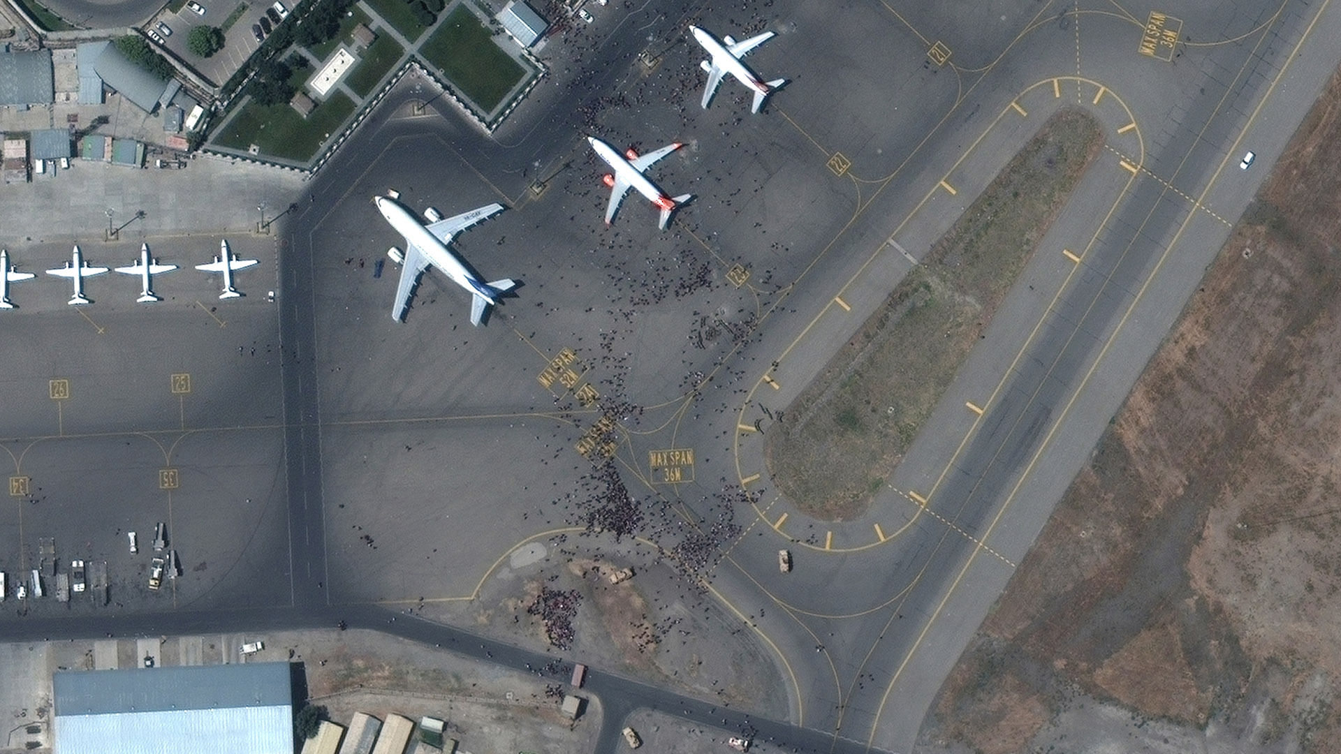 Kabul airport satellite image show chaos and crowds as thousands try to flee Afghanistan. South China Morning Post