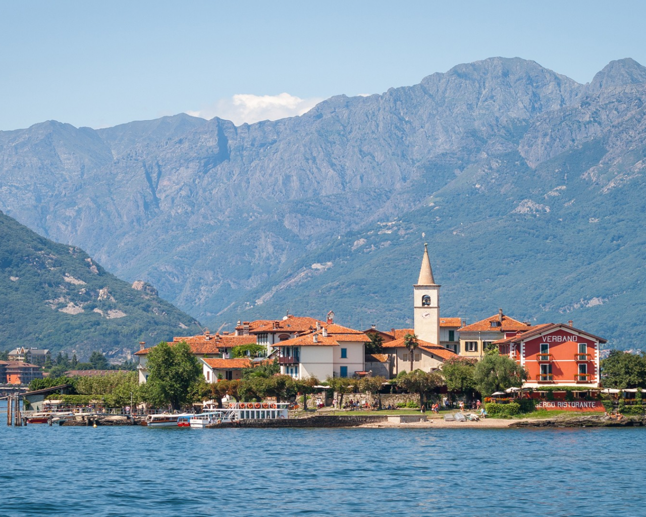 Download 1280x1024 Lake Maggiore, Lago Verbano, apls, italy, switzerland, island, lake, mountains, nature Wallpaper