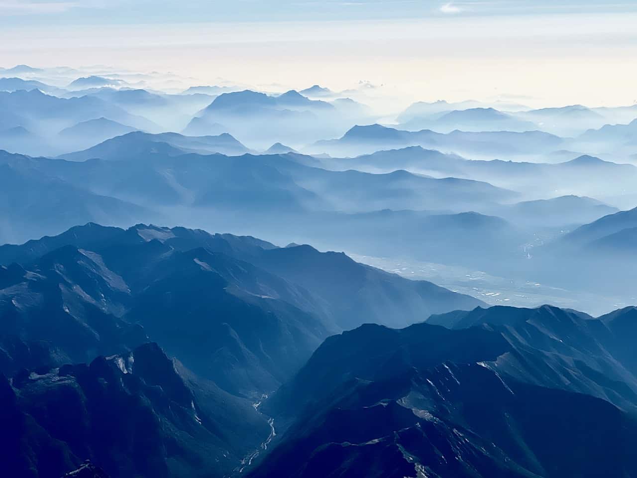Views of the Swiss Alps and Lago Maggiore from a plane window