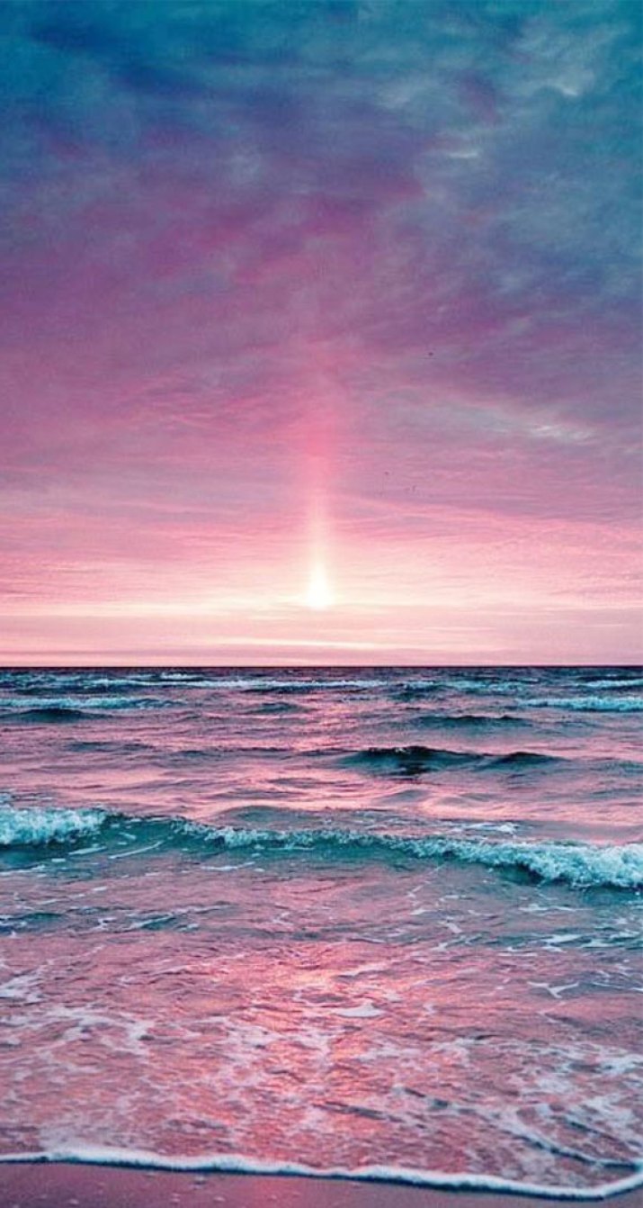 Mauve sky sunset at the beach Wallpaper