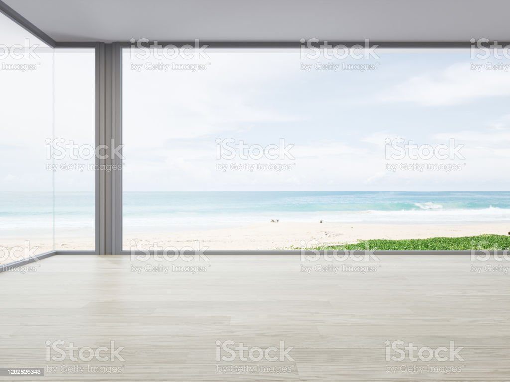 Sea View Large Living Room Of Luxury Summer Beach House With Big Glass Window And Wooden Floor Image Now