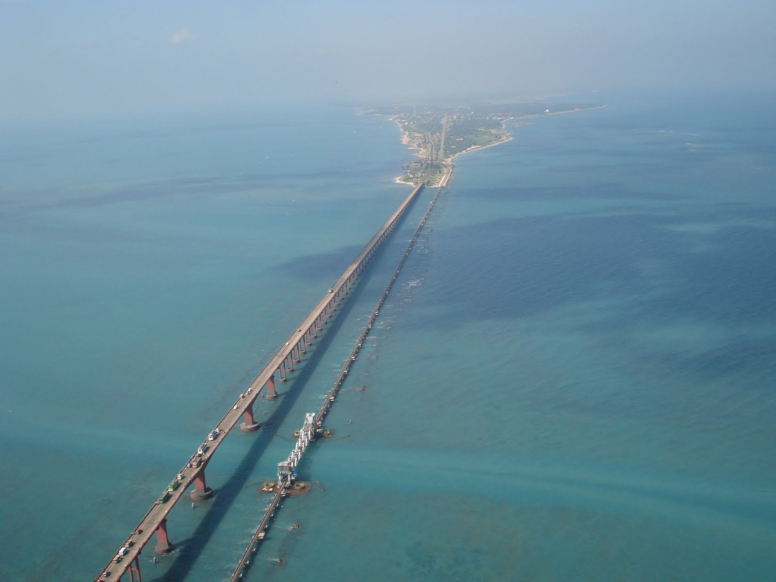 The Pamban Bridge in Tamilnadu cantilever bridge on the Palk Strait connects Rameswaram on Pamban Island to ma. Pamban bridge, Tourist places, Places to visit