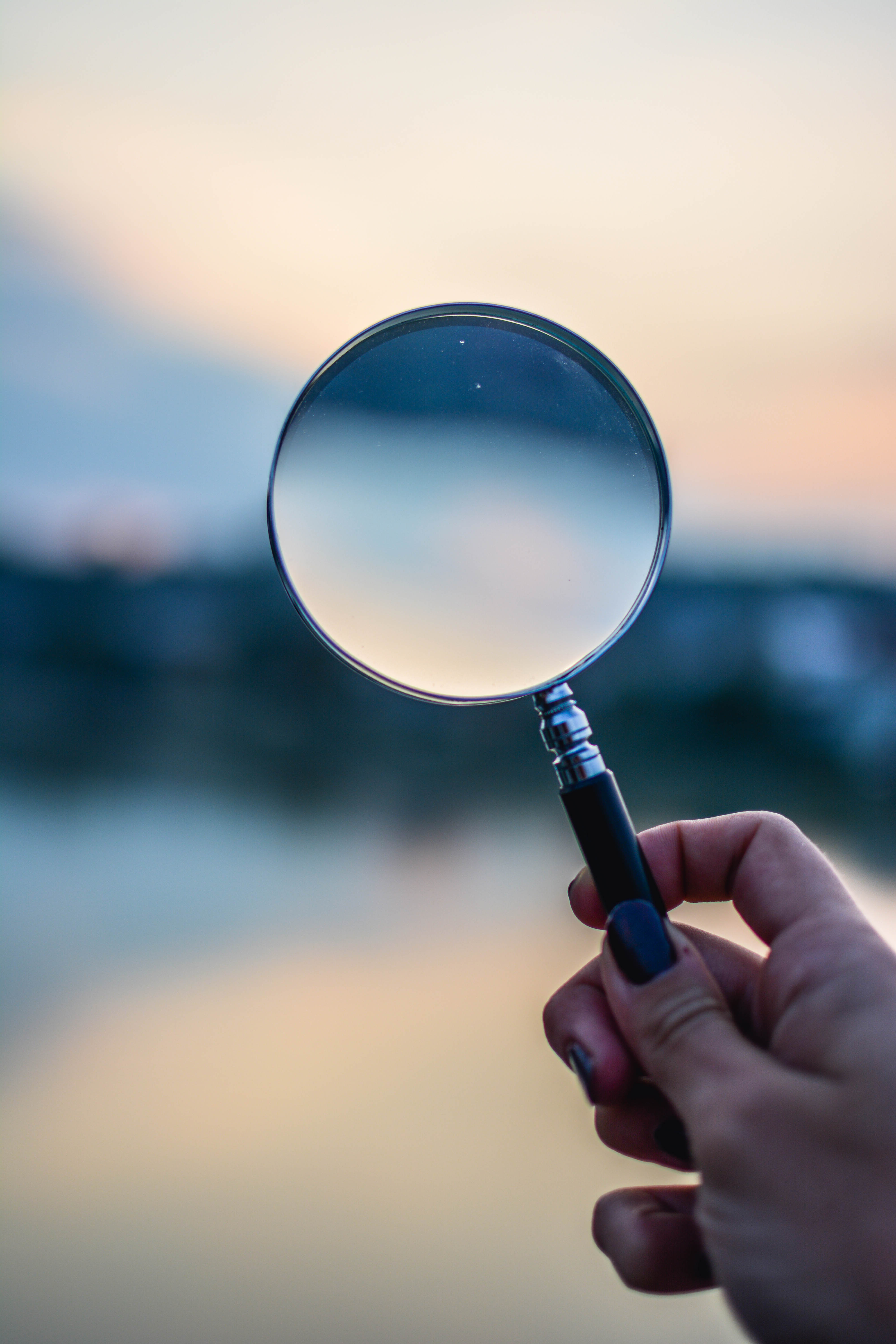 Selective Focus Photo of Magnifying Glass · Free
