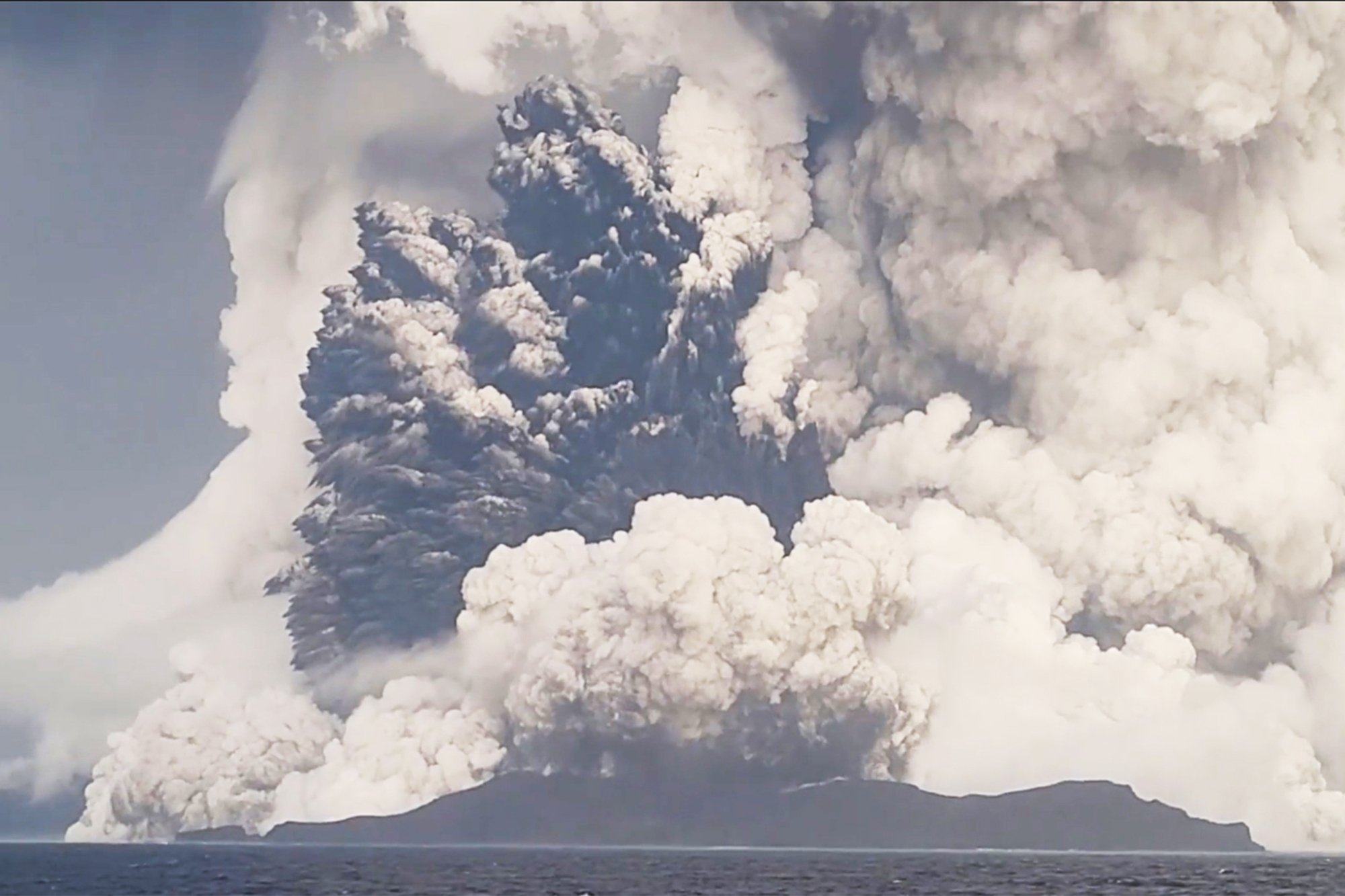 Photos show Tonga volcano collapsing just before eruption