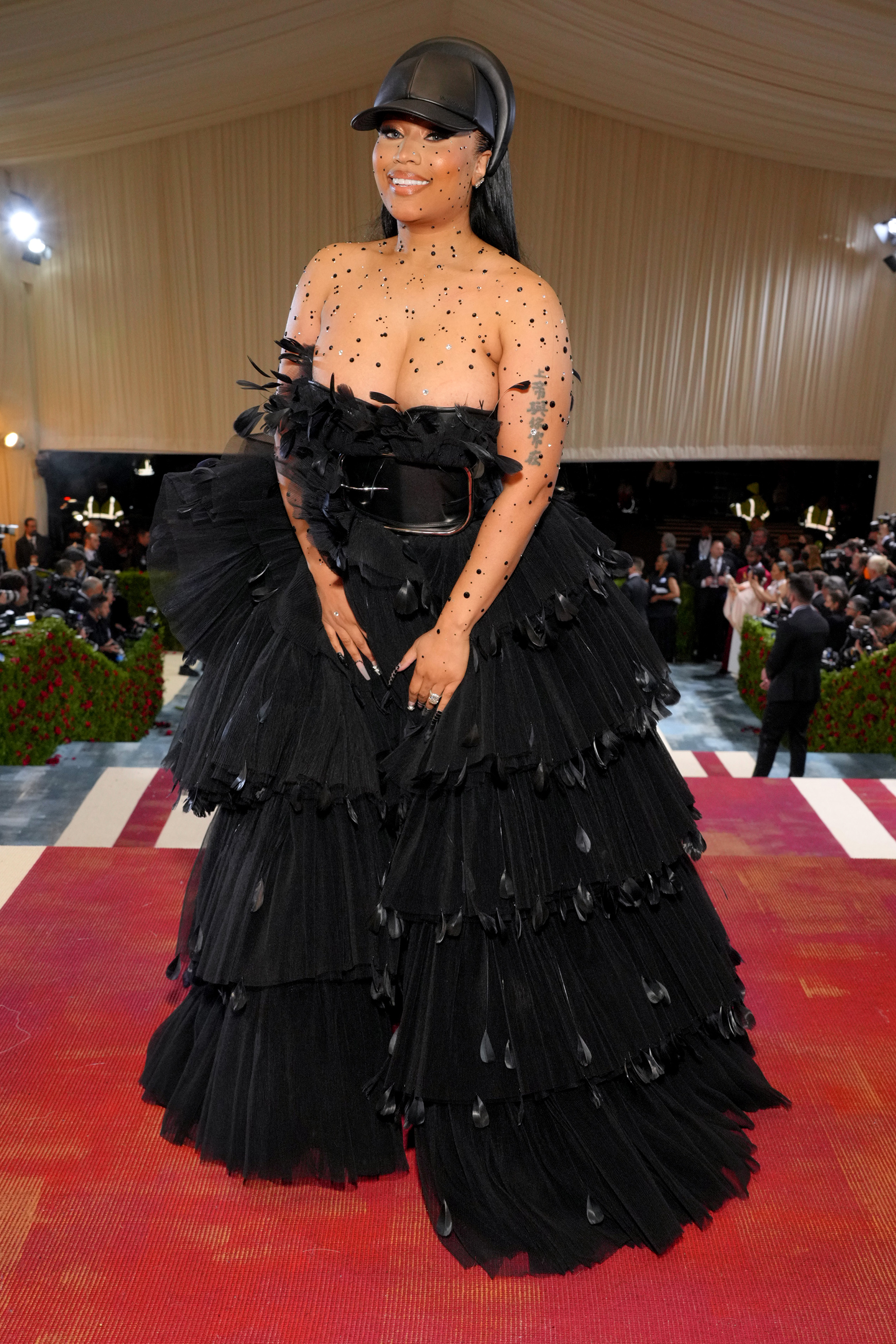 Nicki Minaj walks Met Gala 2022 red carpet with 'boobs popping out'