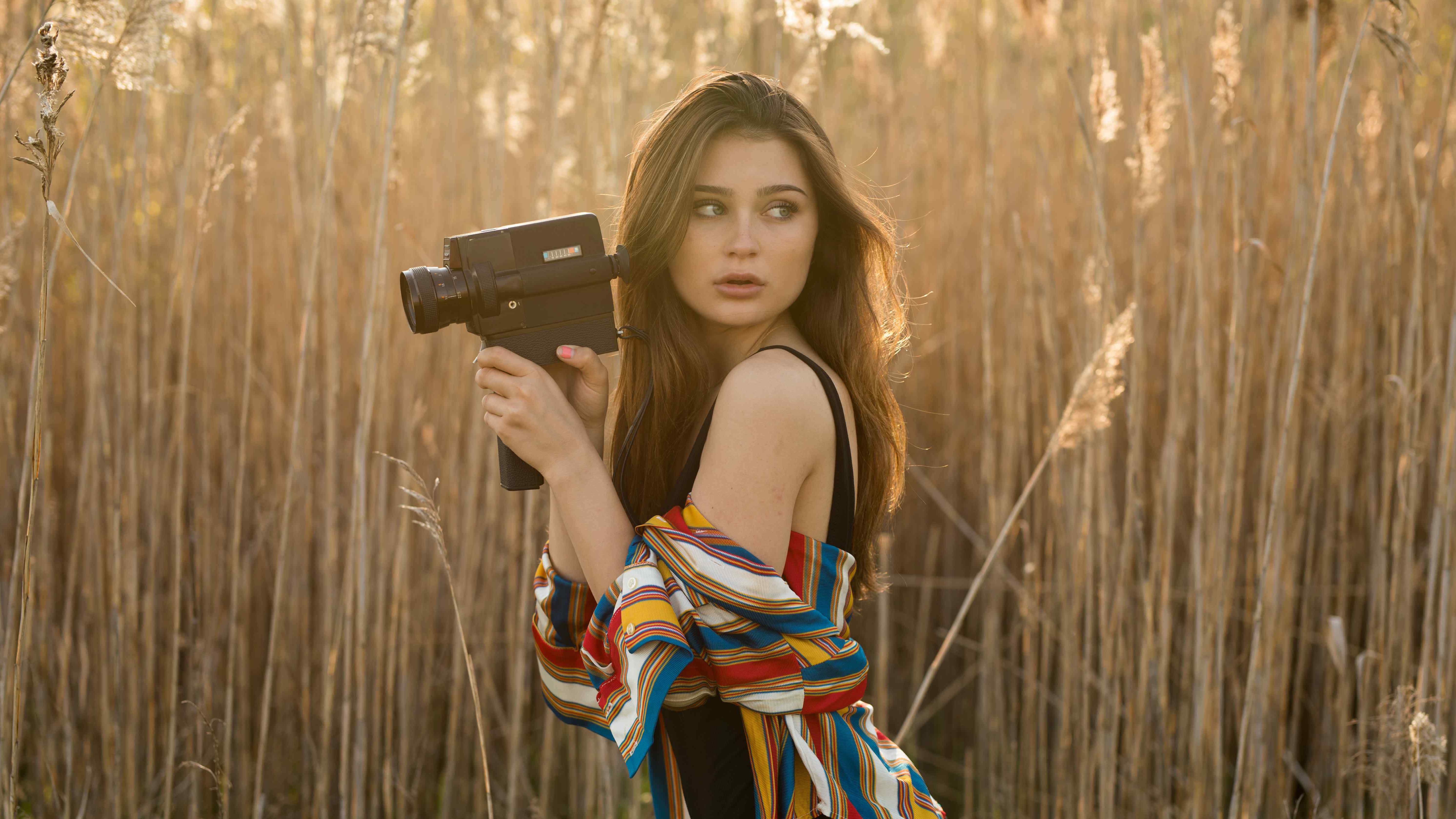 Brunette Girl In Field With Camera, HD Girls, 4k Wallpaper, Image, Background, Photo and Picture