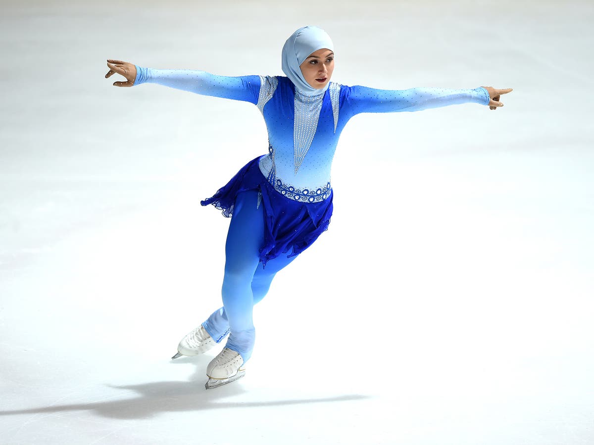 Zahra Lari: Woman becomes first to take part in international figure skating competition wearing a headscarf