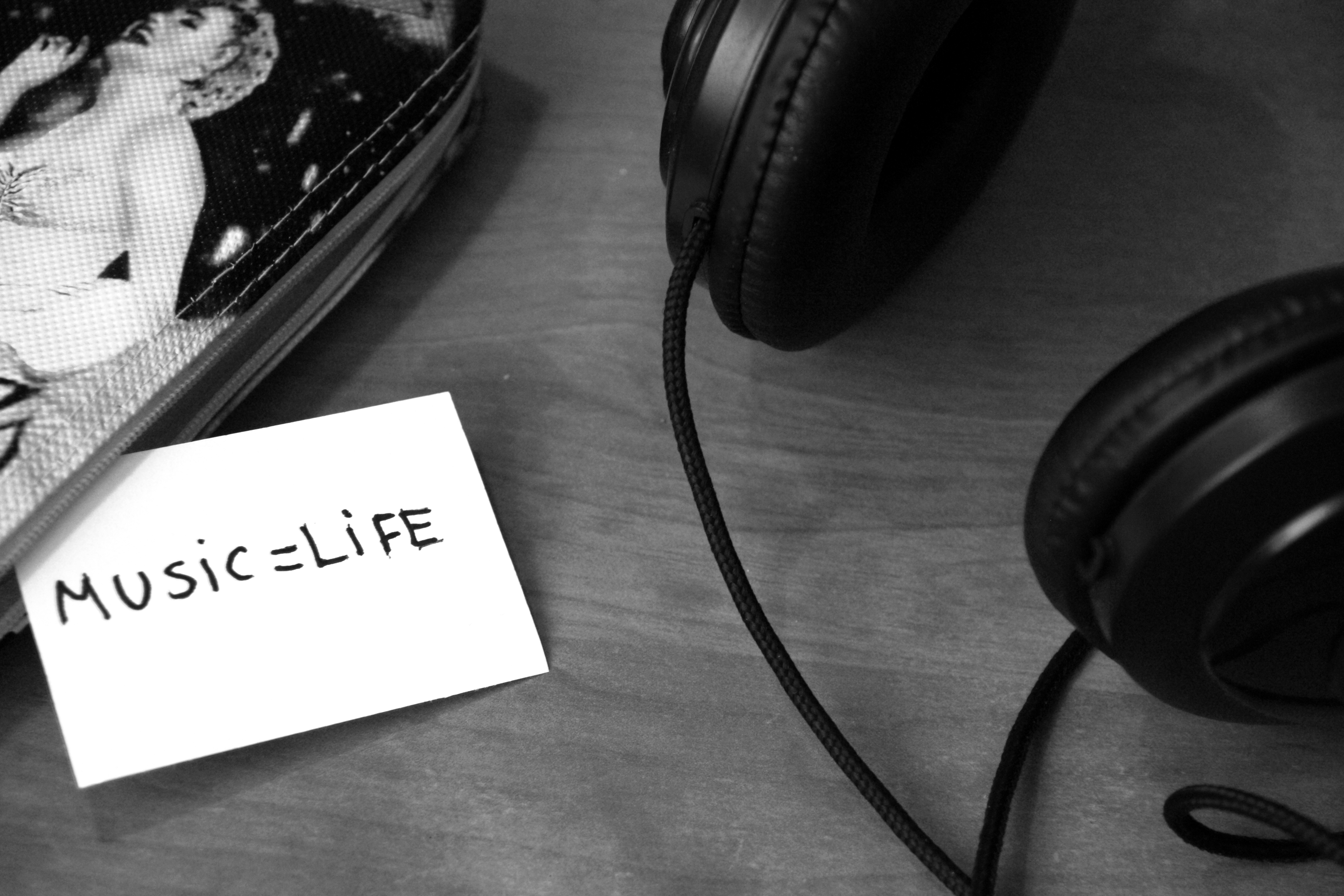Grayscale Photo of Printer Paper With Printed Music = Life Near Headphones · Free