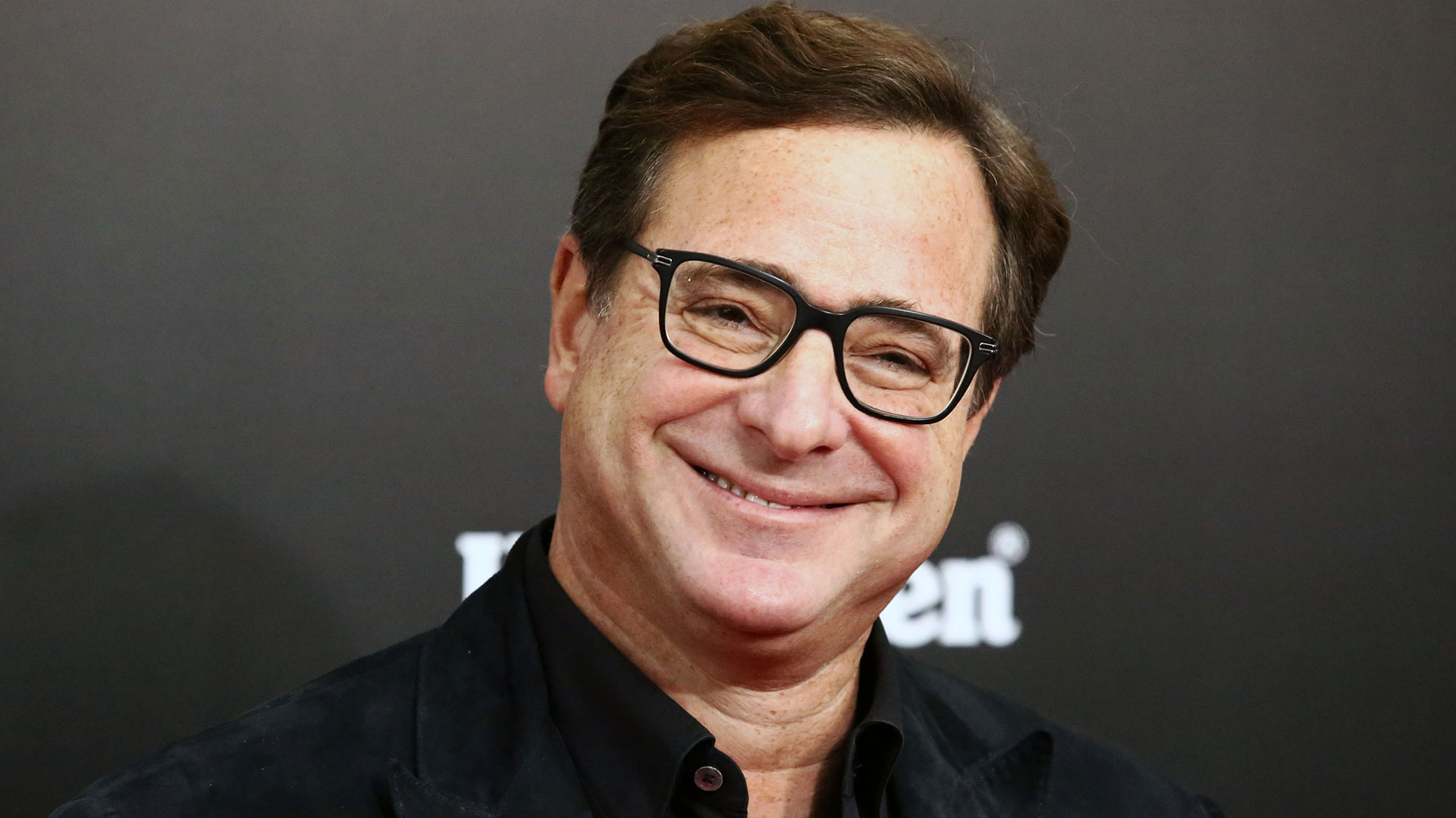 Bob Saget Dead At 65: John Stamos, Jon Stewart, Norman Lear & More Stars React