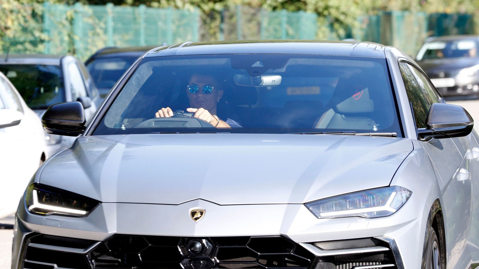 Cristiano Ronaldo arrives for Manchester United training in a Lamborghini Urus