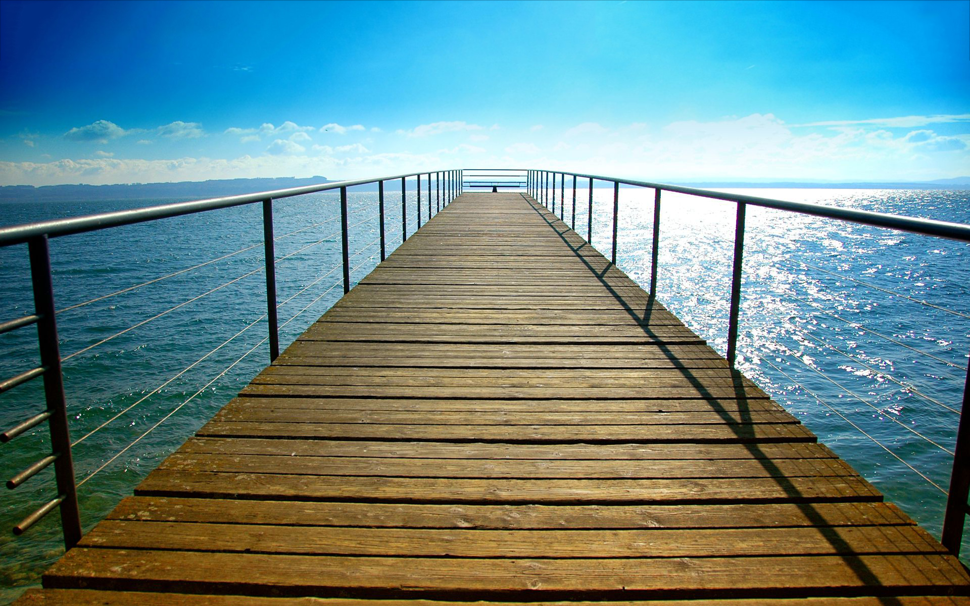 Sunny day lake bridge