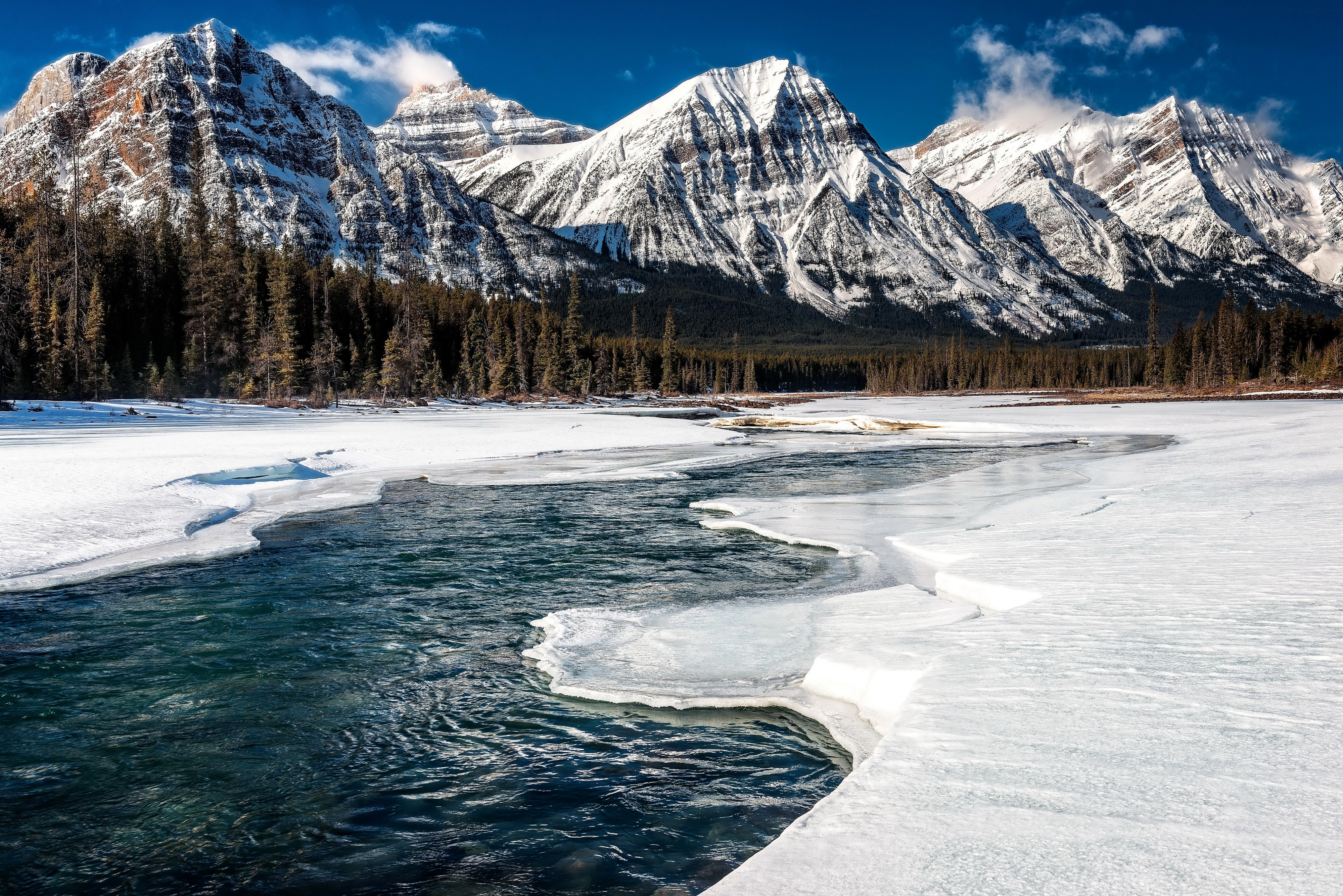 Download Wallpaper snow winter river canada mountains, 4000x2669, Mountains and frozen river, Canada