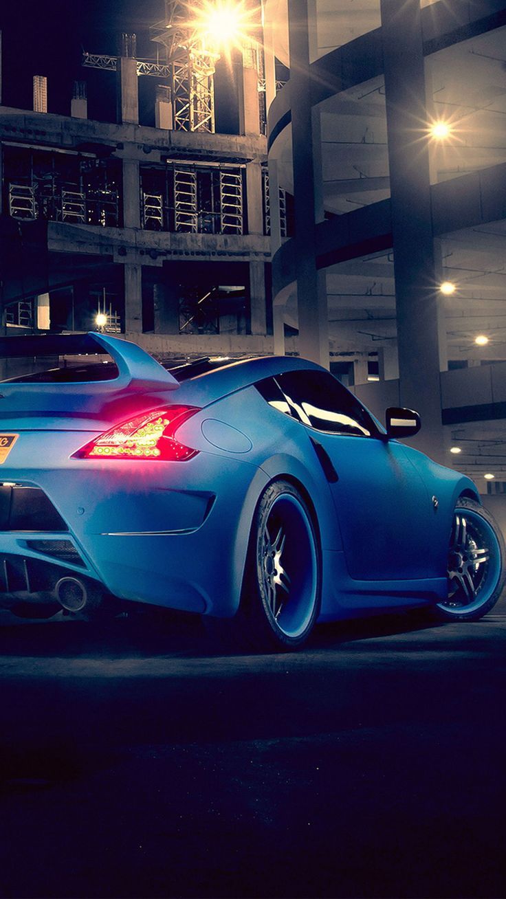 Nissan 370z car wallpaper #iPhone #android #nissan #car #wallpaper more like this on wallzapp.com. Nissan 370z. Car wallpaper, Nissan 370z, Sports car wallpaper