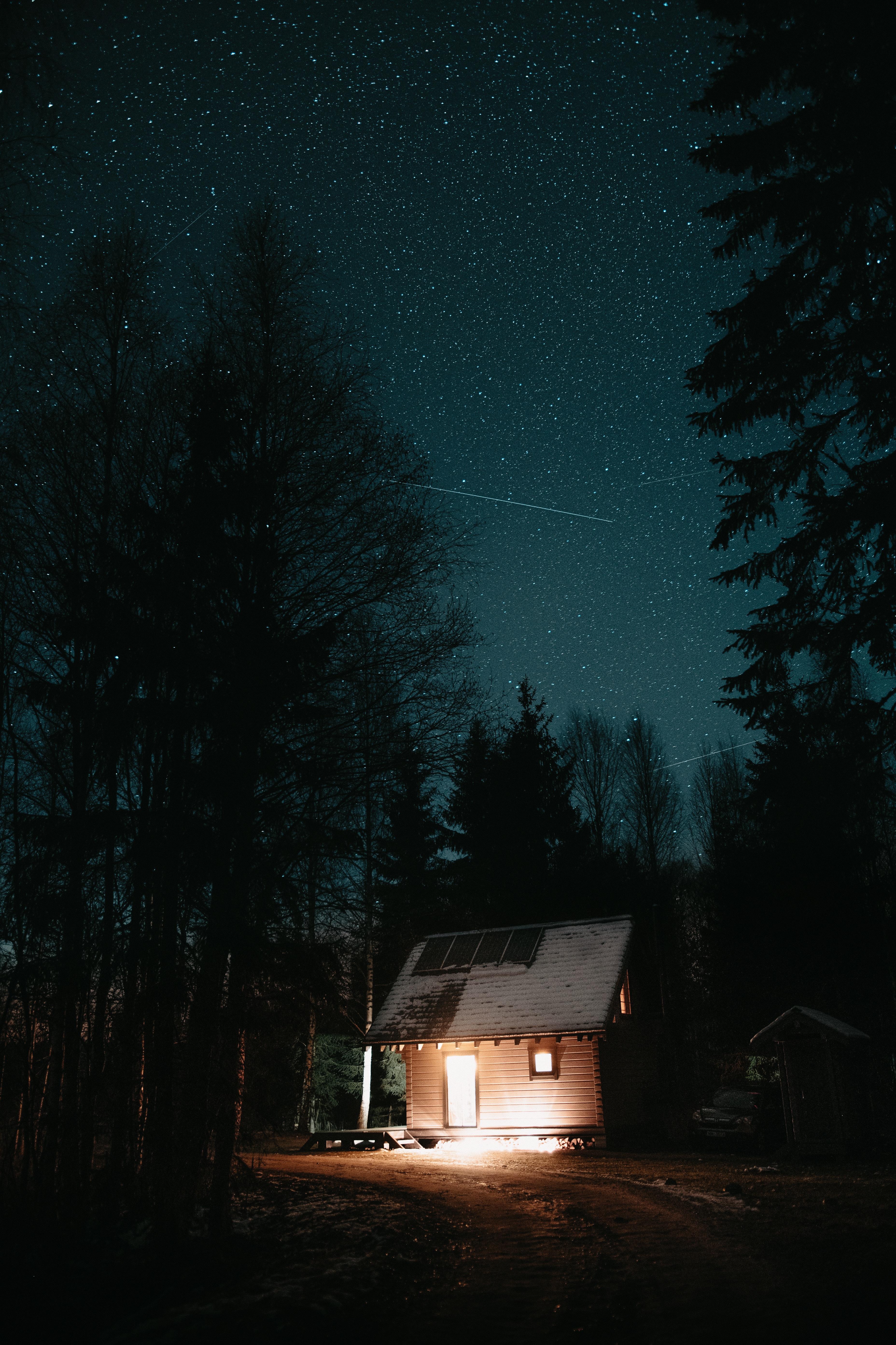 Download wallpaper 3712x5568 house, night, starry sky, trees, darkness, light HD background