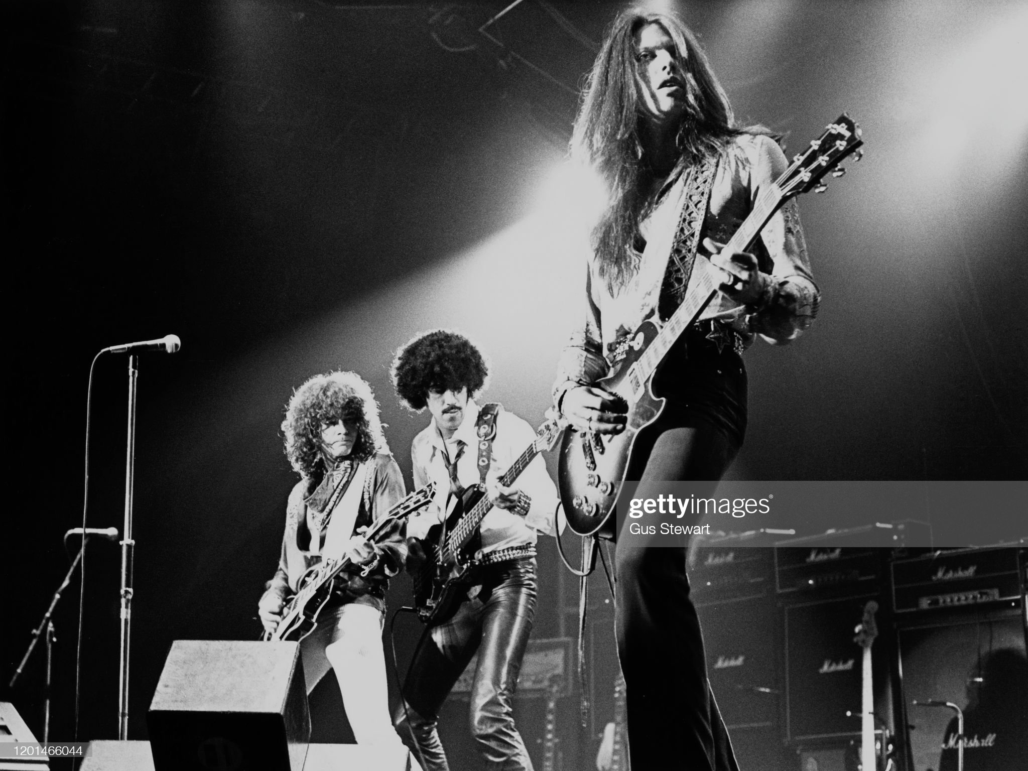 Musicians Brian Robertson, Phil Lynott, Scott Gorham of hard rock. News Photo