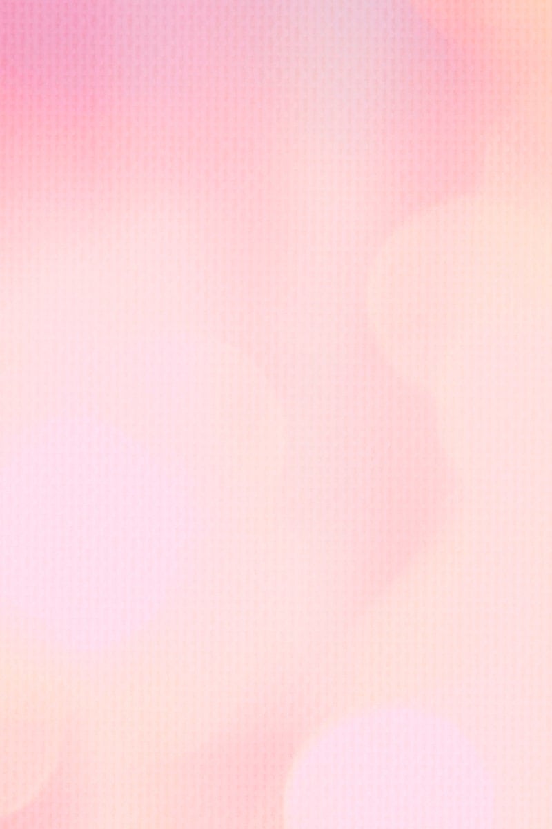 Salmon pink bokeh patterned background