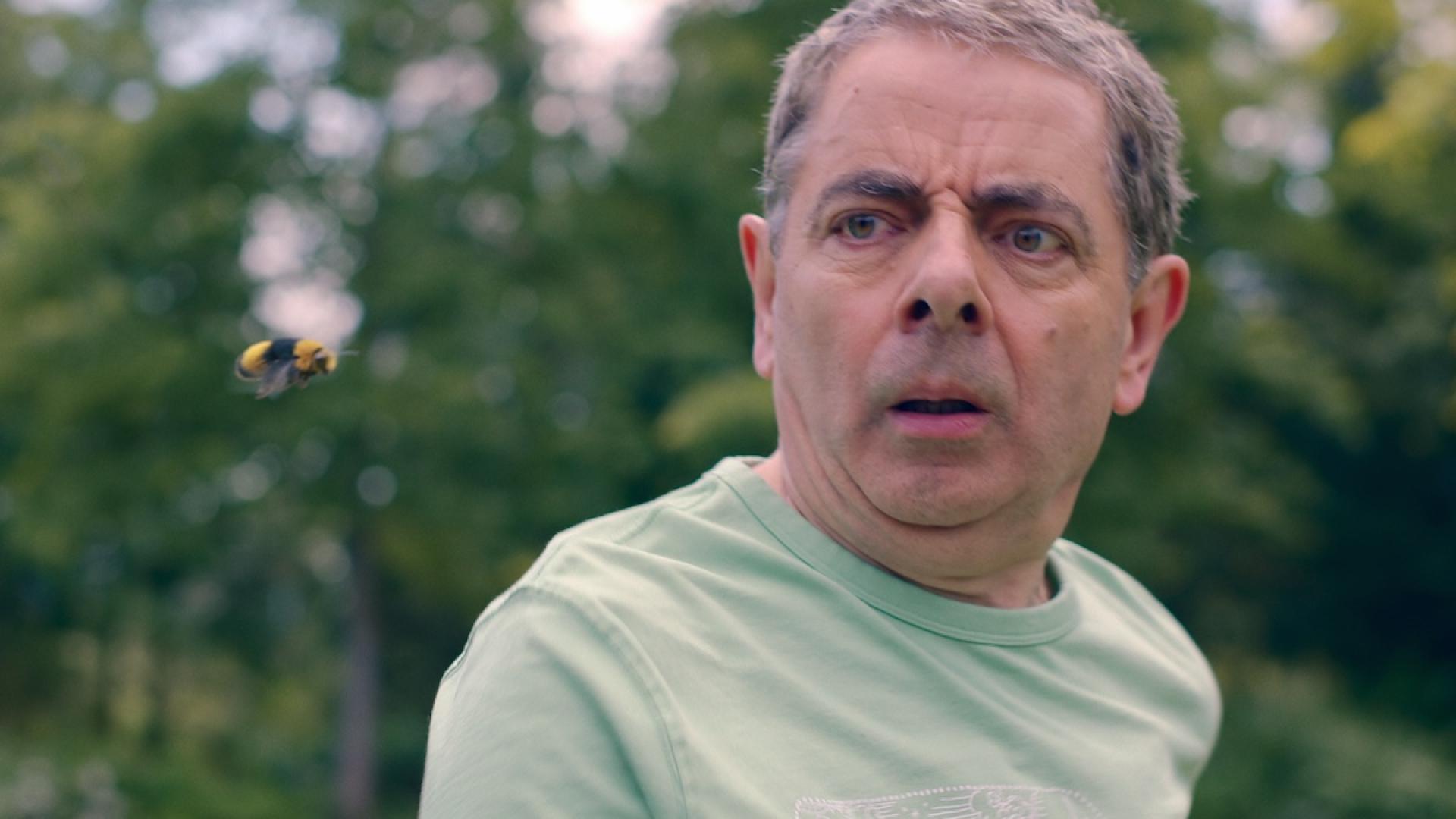 Rowan Atkinson Goes to War with an Insect in for 'Man vs. Bee'